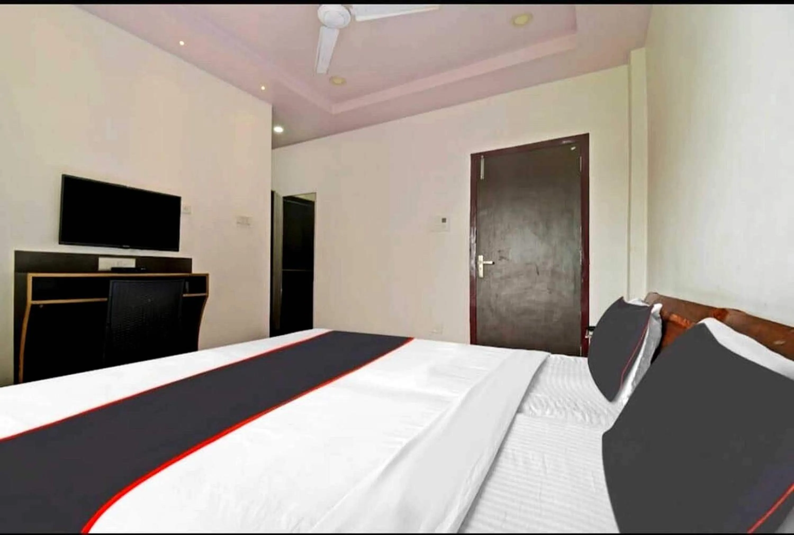 Bedroom in Collection O Megha Resort