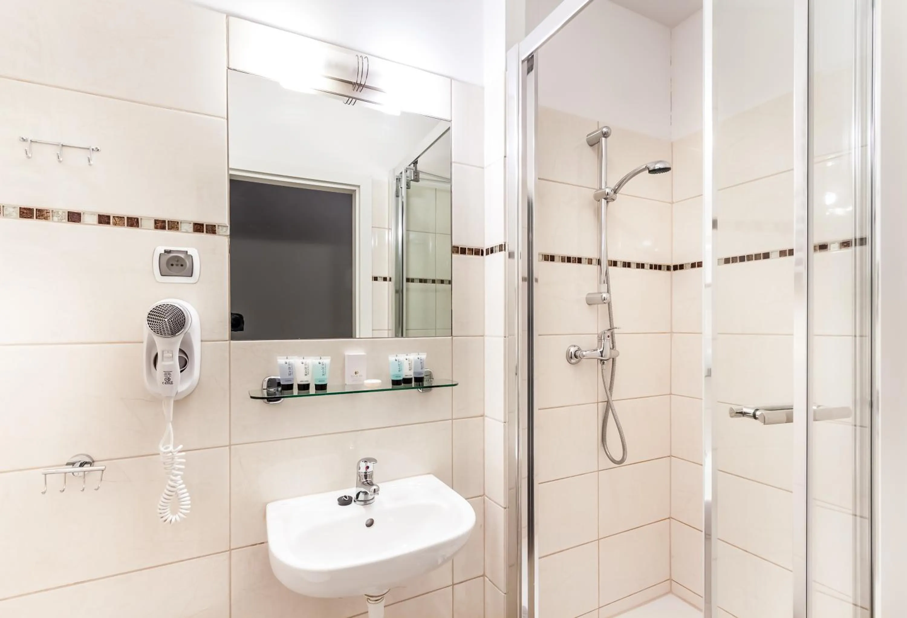 Bathroom in Leone Aparthotel