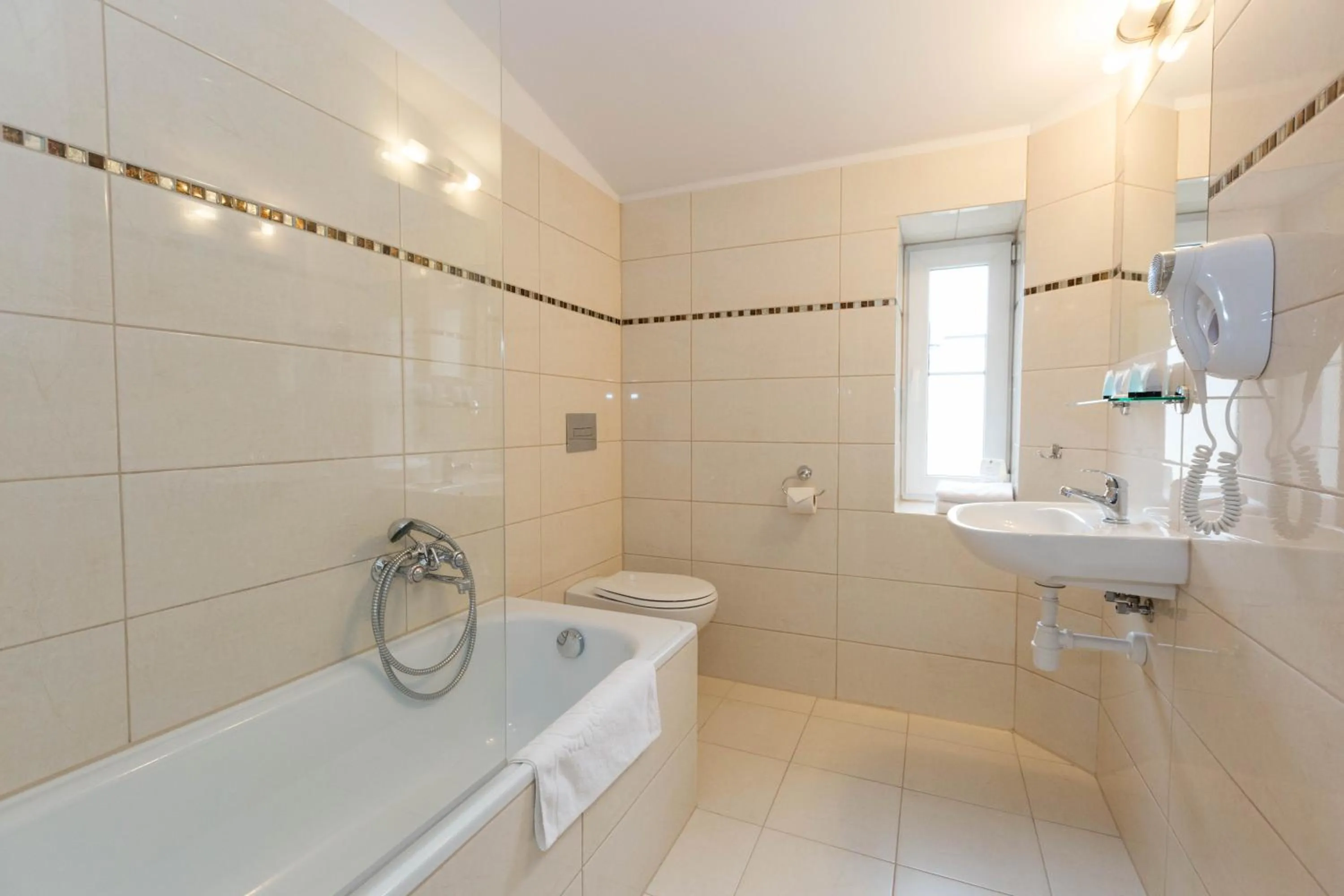 Bathroom in Leone Aparthotel