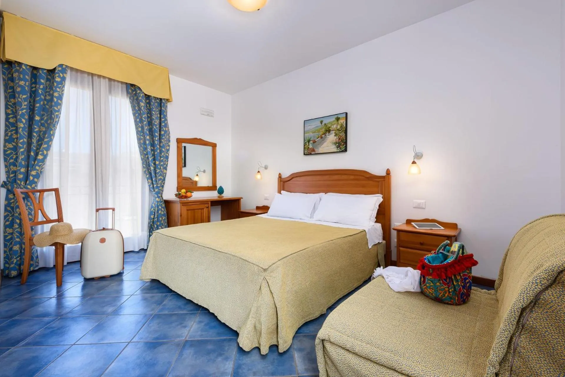 Bed in La Meridiana Hotel