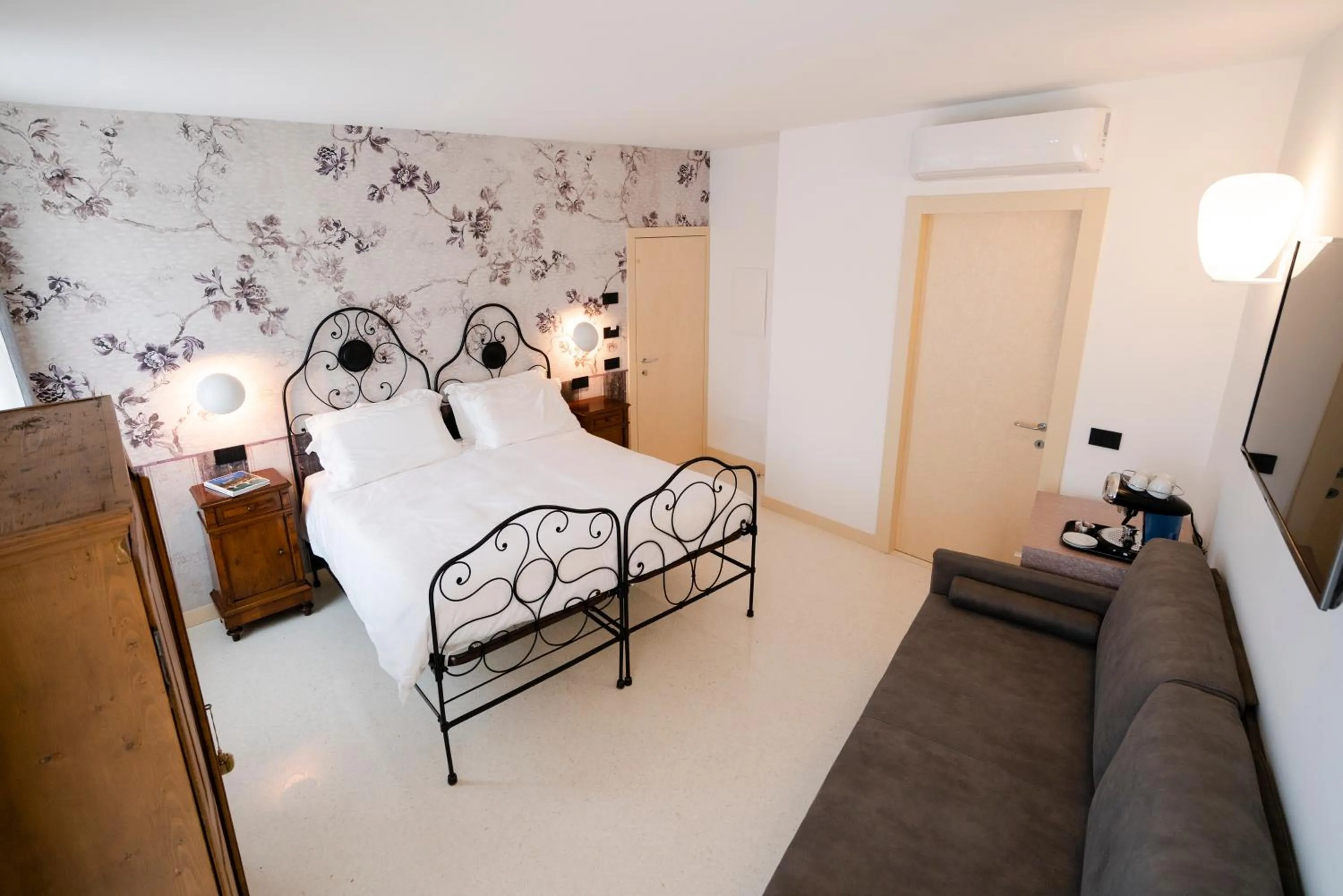 Bed in Antica Pusterla Relais de Charme