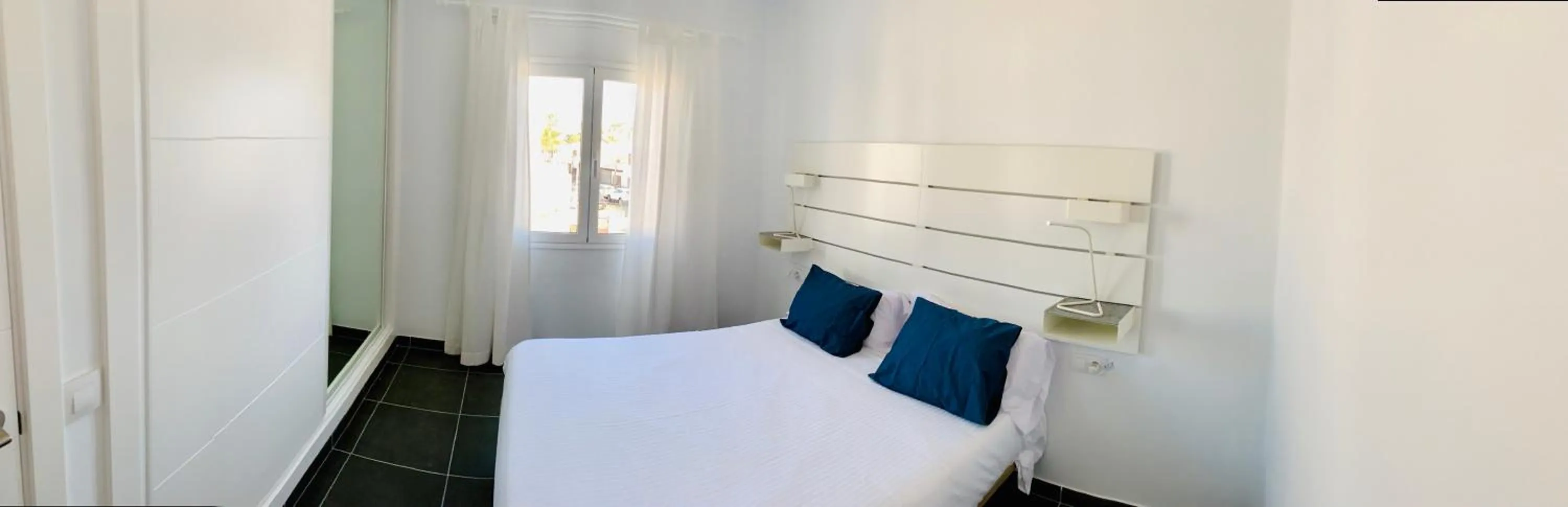 Bed in Apartamentos Zalabar