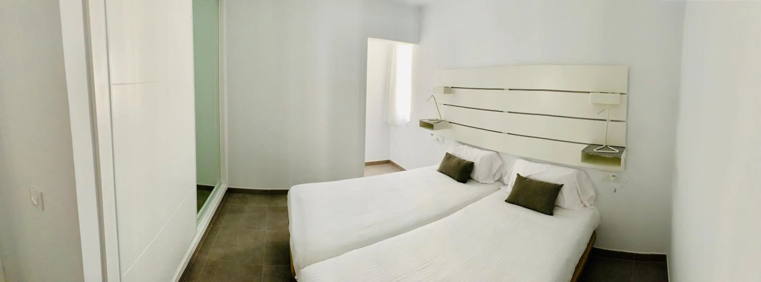 Bed in Apartamentos Zalabar