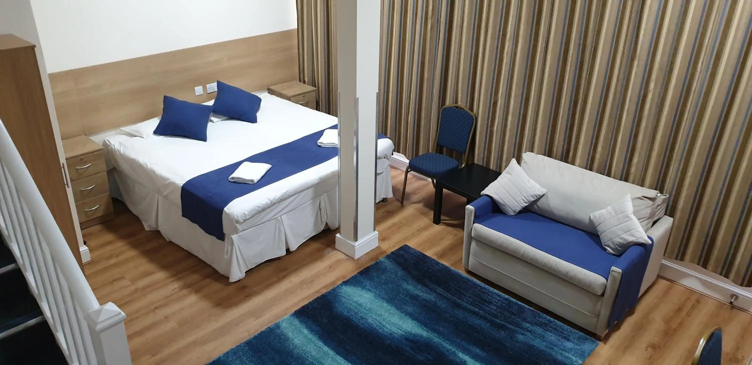 Bedroom, Bed in PremierLux Serviced Apartments