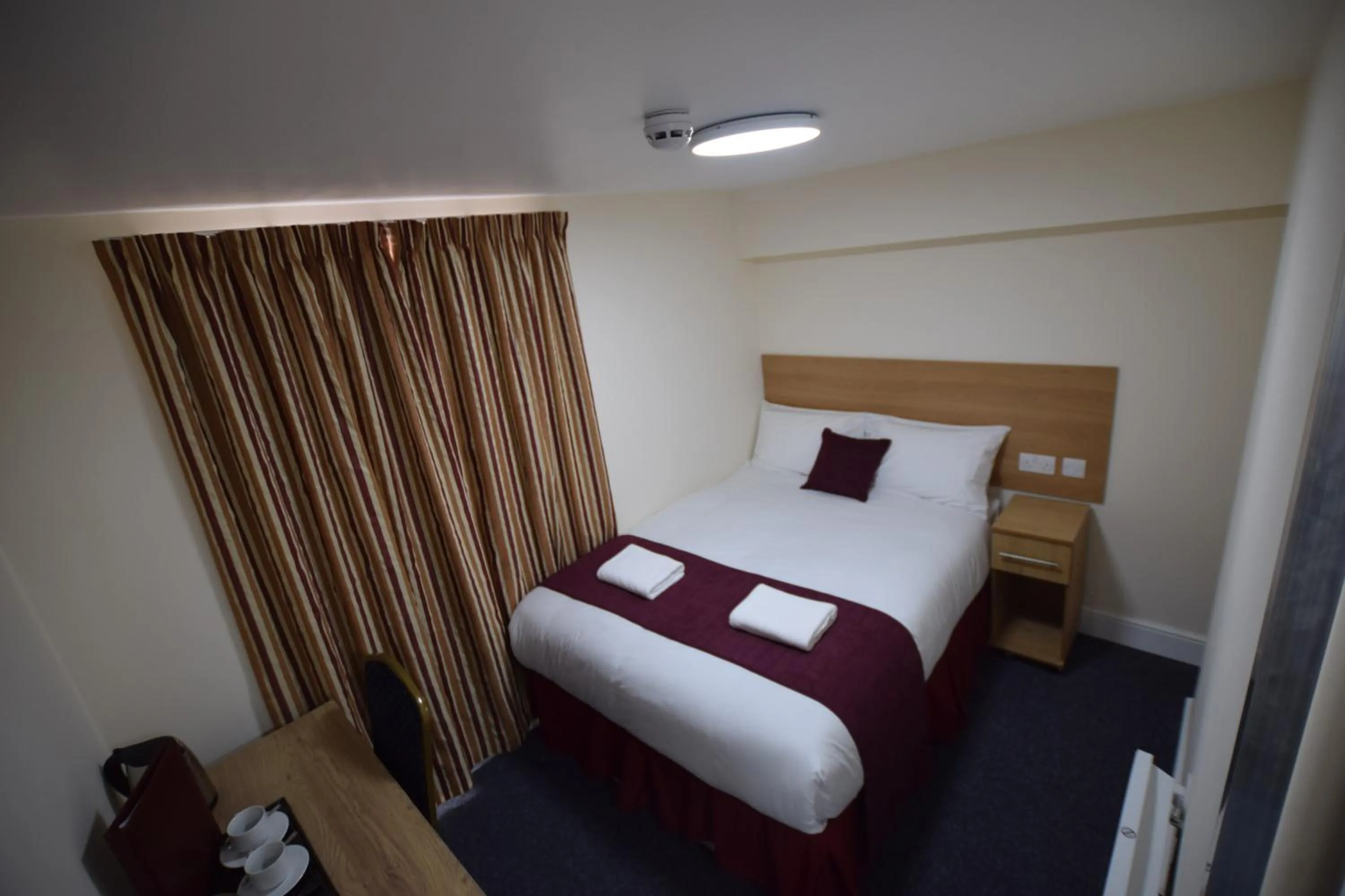 Bedroom, Bed in PremierLux Serviced Apartments