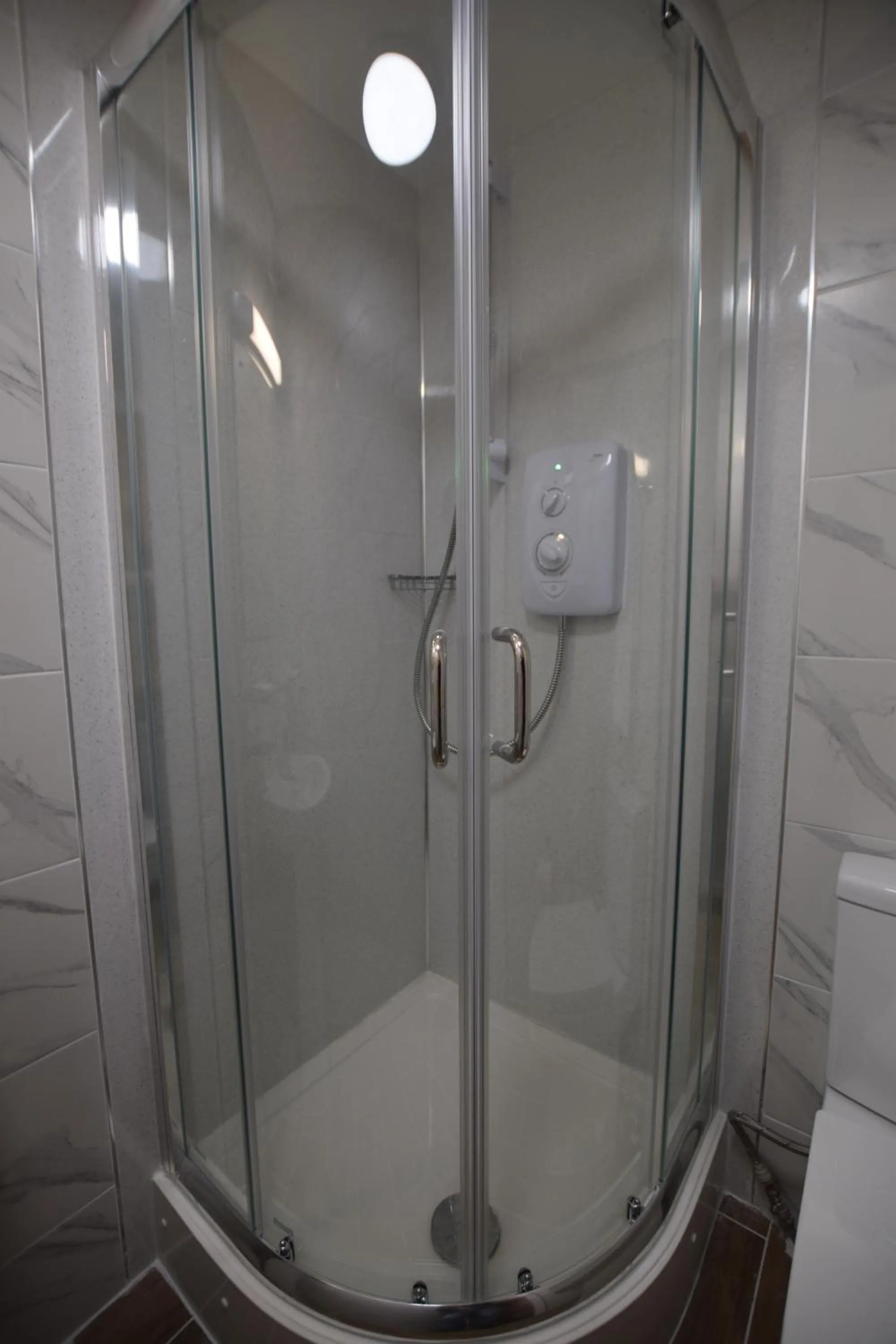 Shower in PremierLux Serviced Apartments
