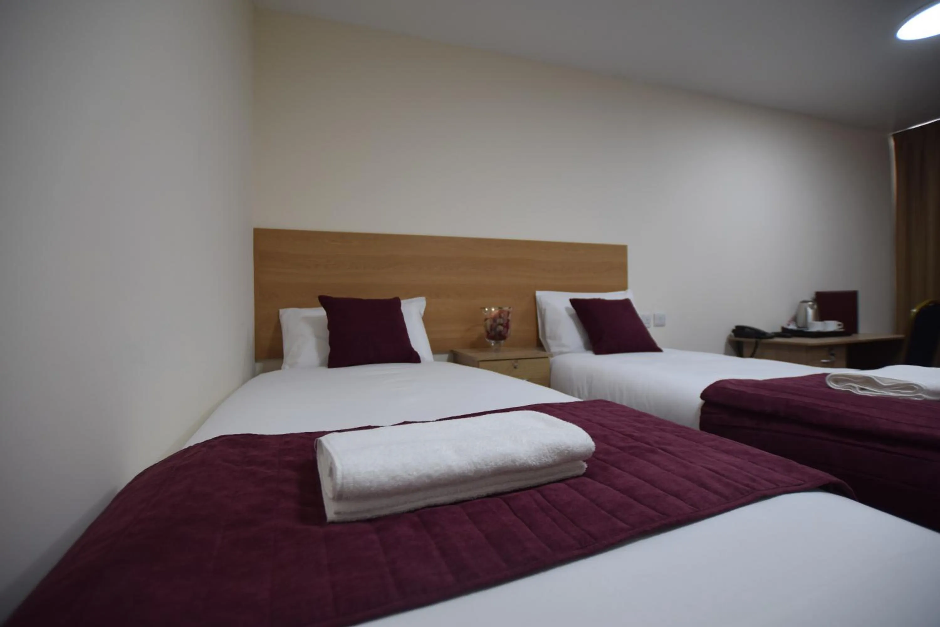Bedroom, Bed in PremierLux Serviced Apartments