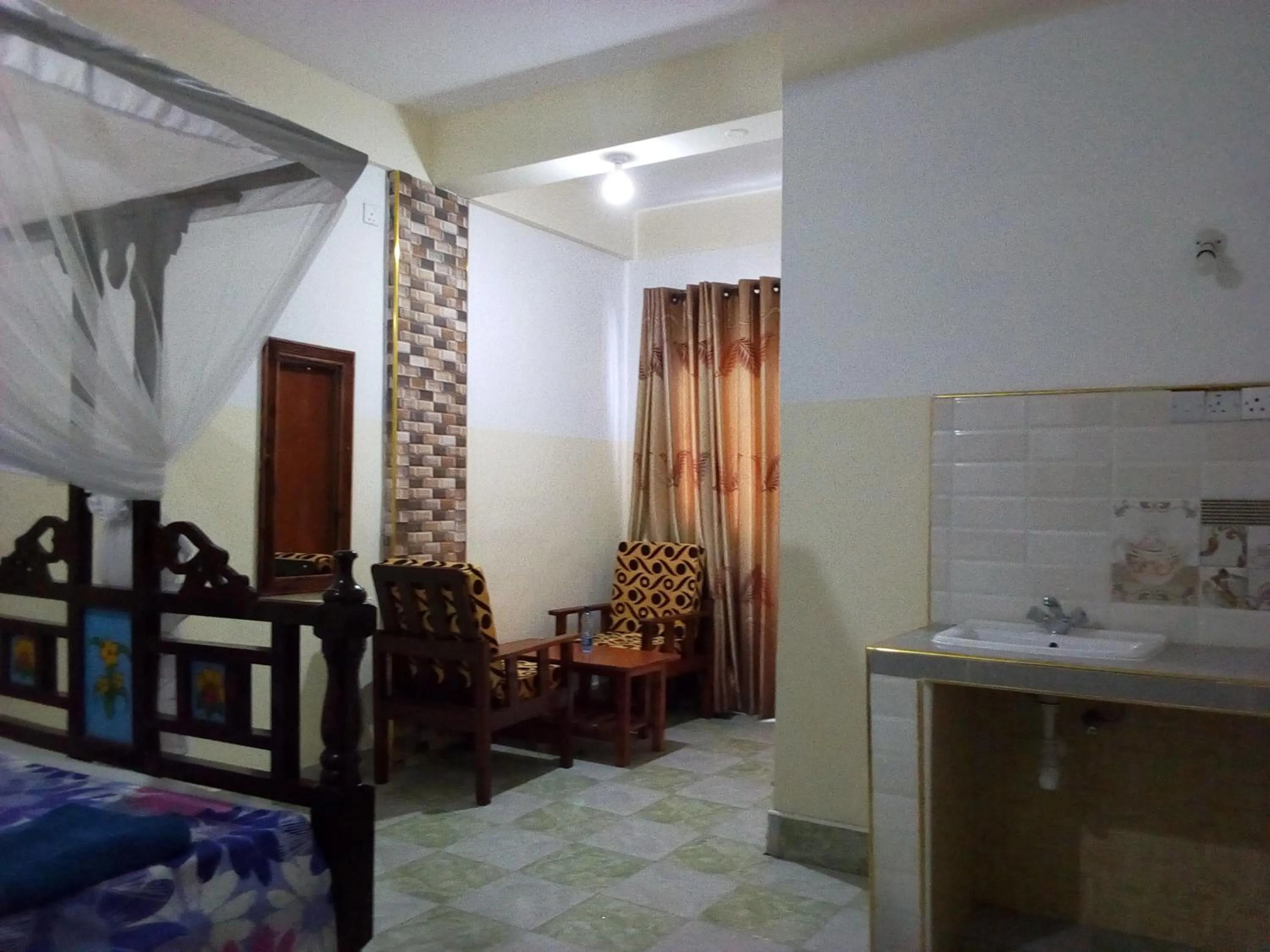 Bed in Premier Guest Residence Hotel