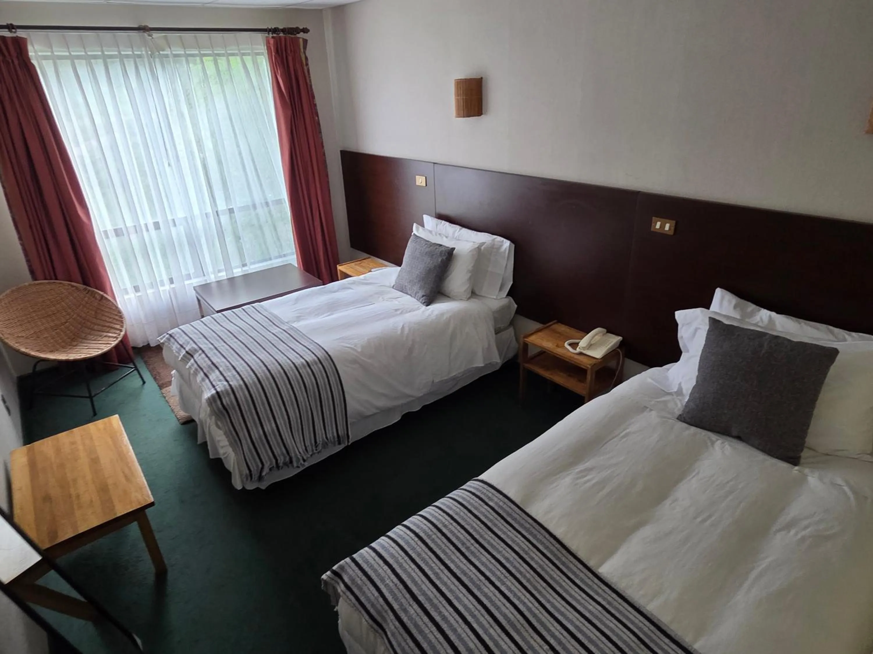 Bed in Hotel HD Natales