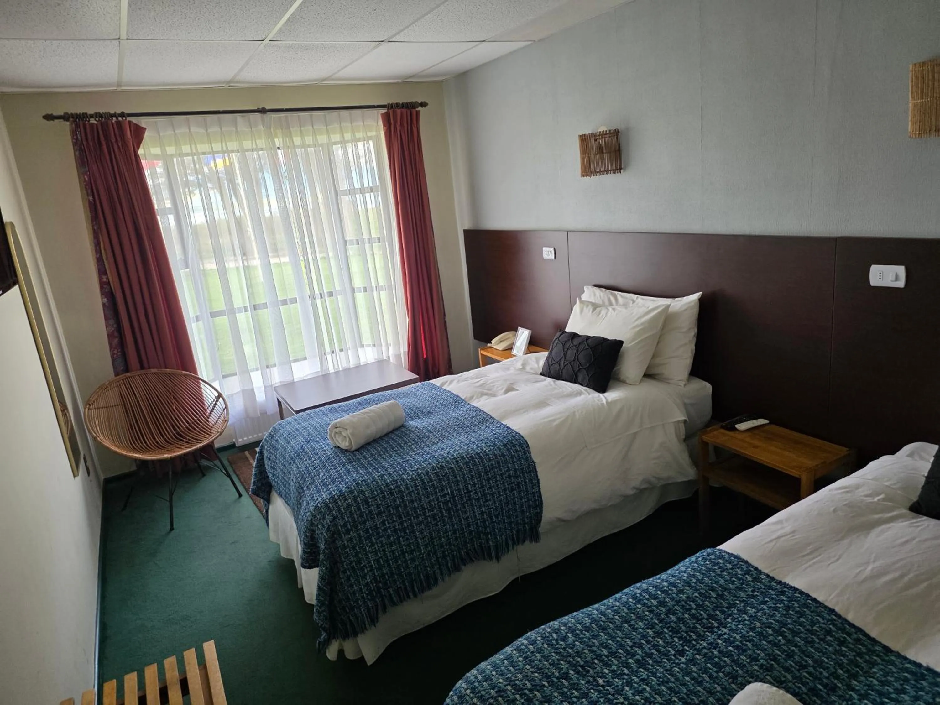 Bed in Hotel HD Natales