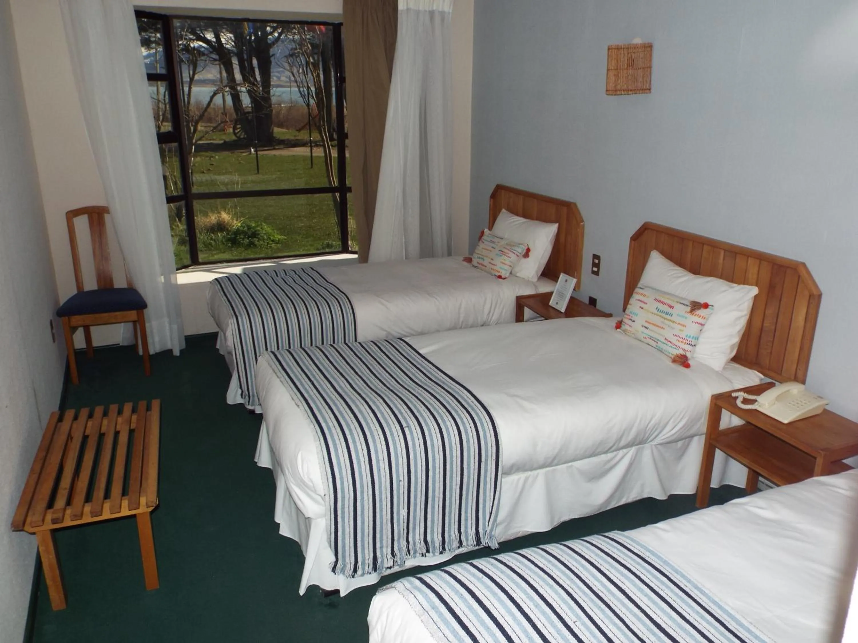 Bed in Hotel HD Natales