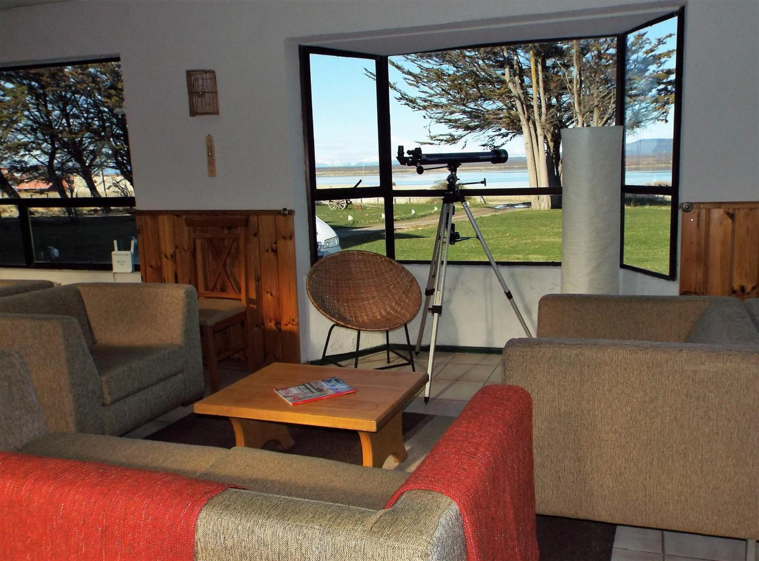 Communal lounge/ TV room in Hotel HD Natales