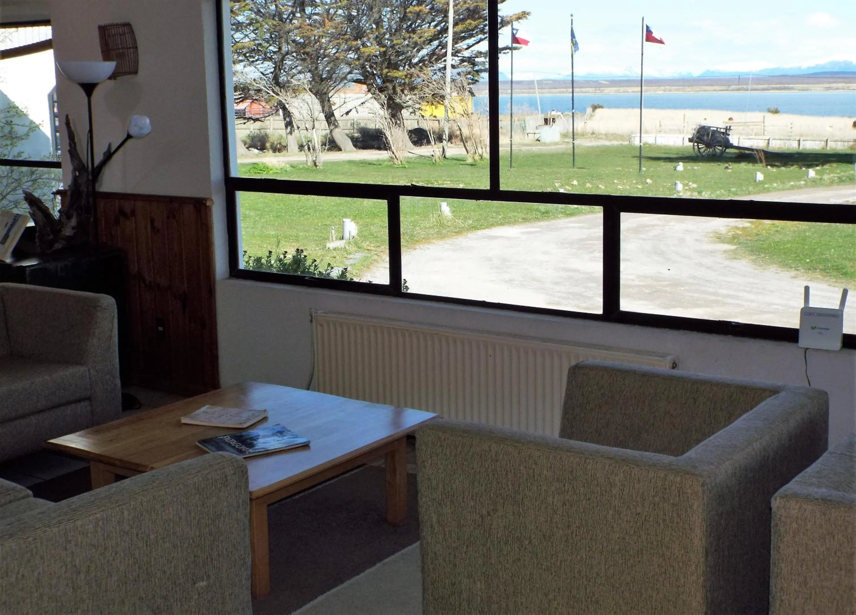 Communal lounge/ TV room in Hotel HD Natales