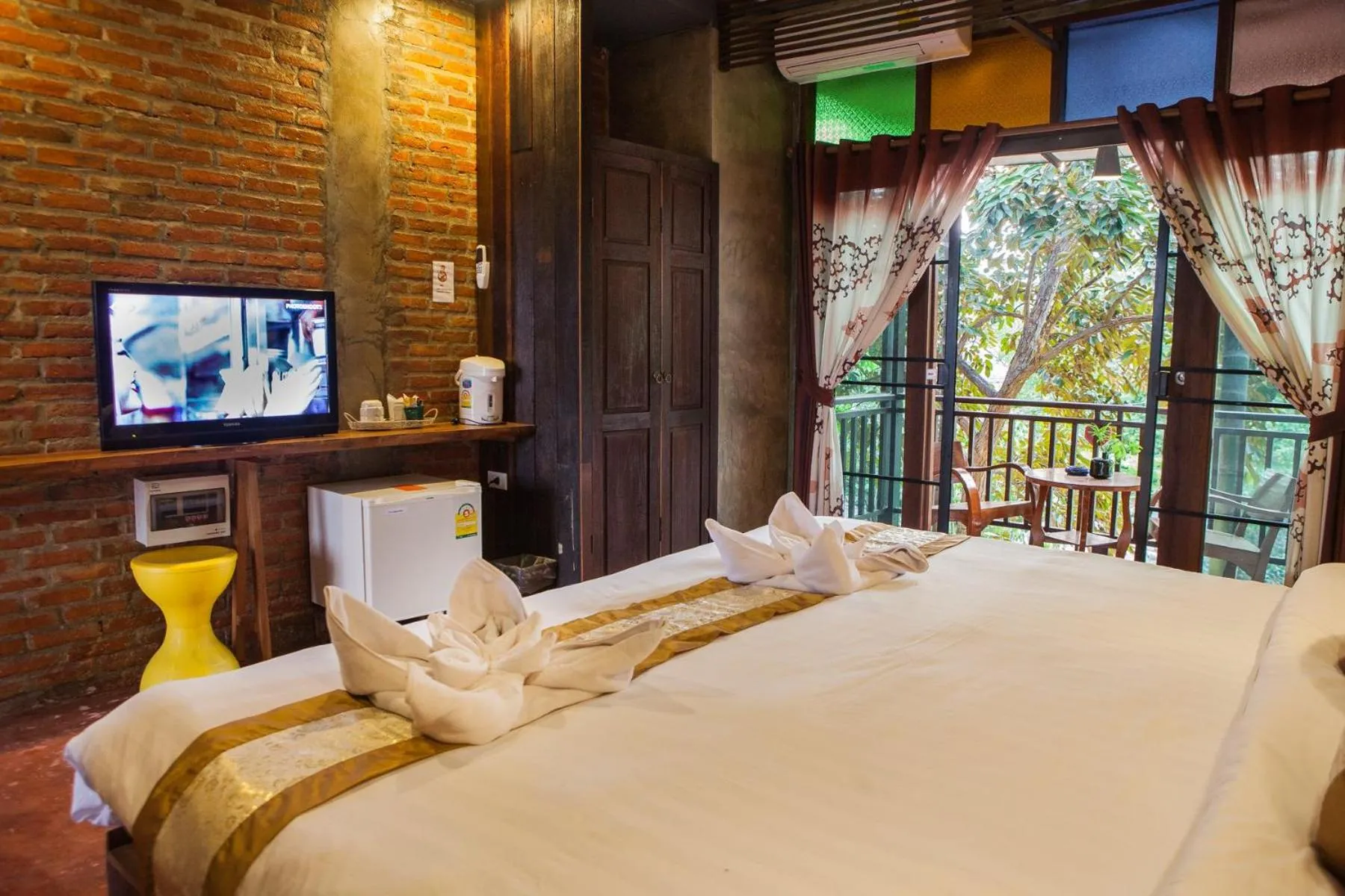 Photo of the whole room, Bed in De Wiang Kum Kam