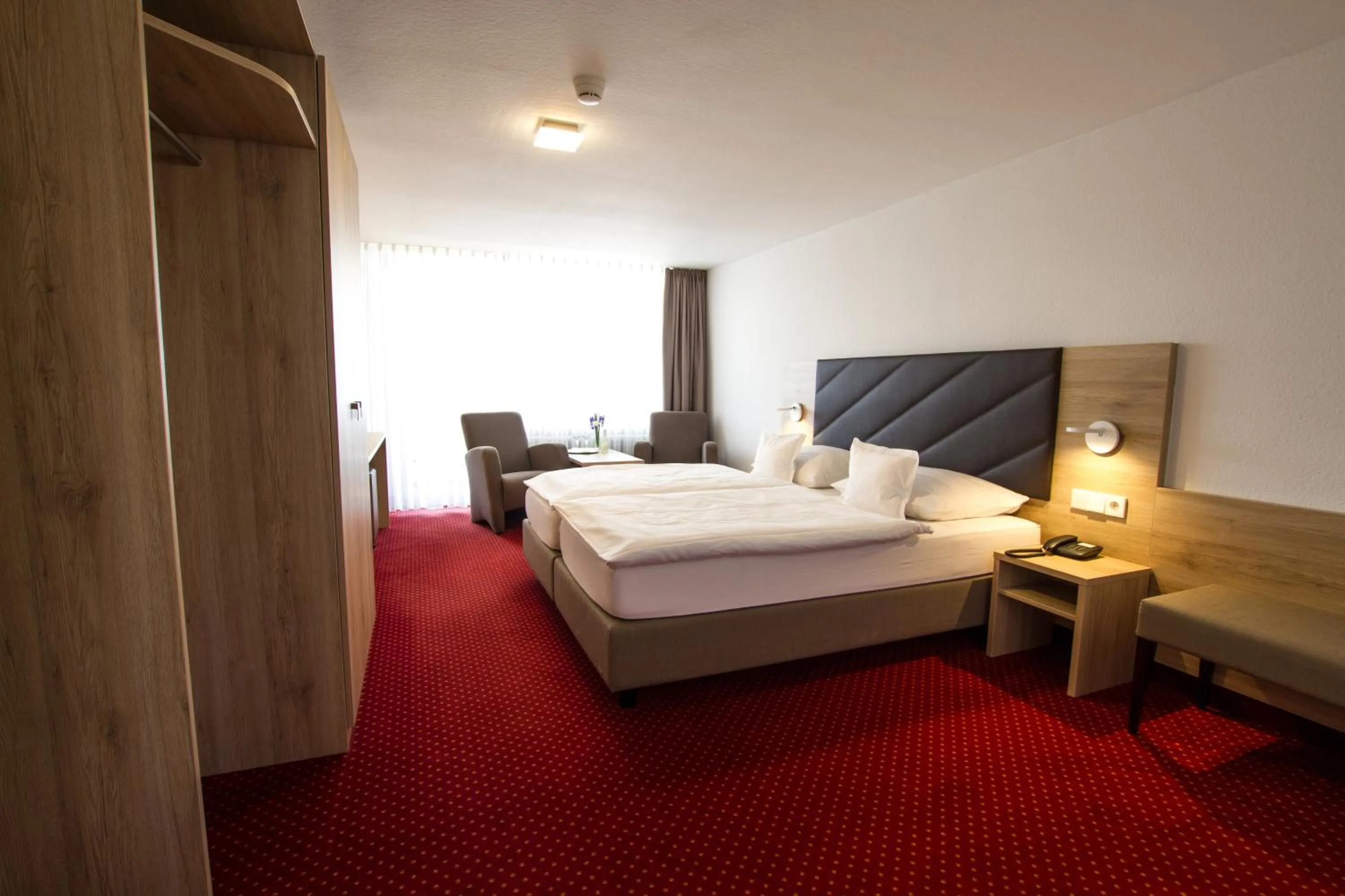 Photo of the whole room, Bed in Hotel Seepark Garni