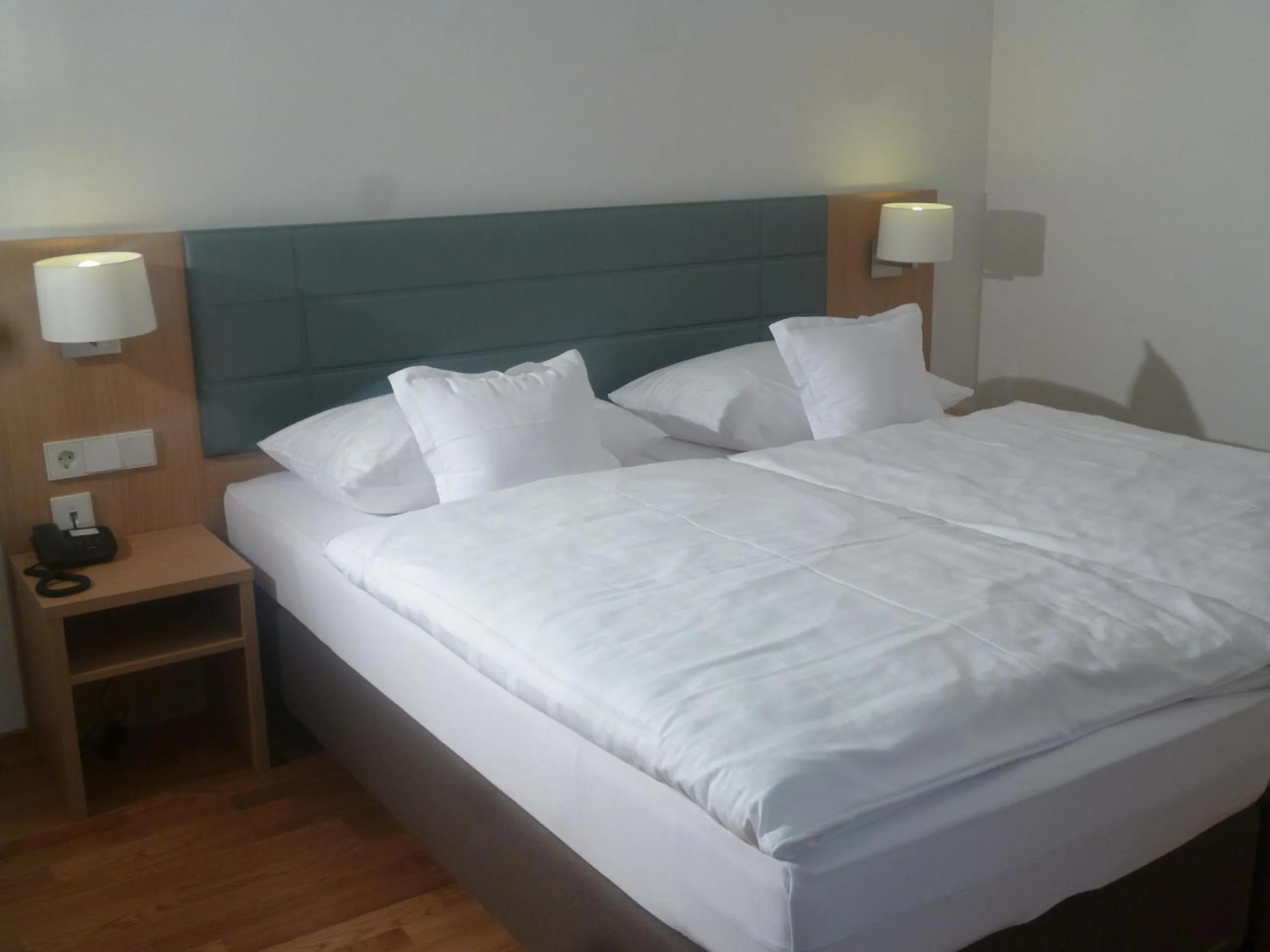 Bed in Hotel Seepark Garni
