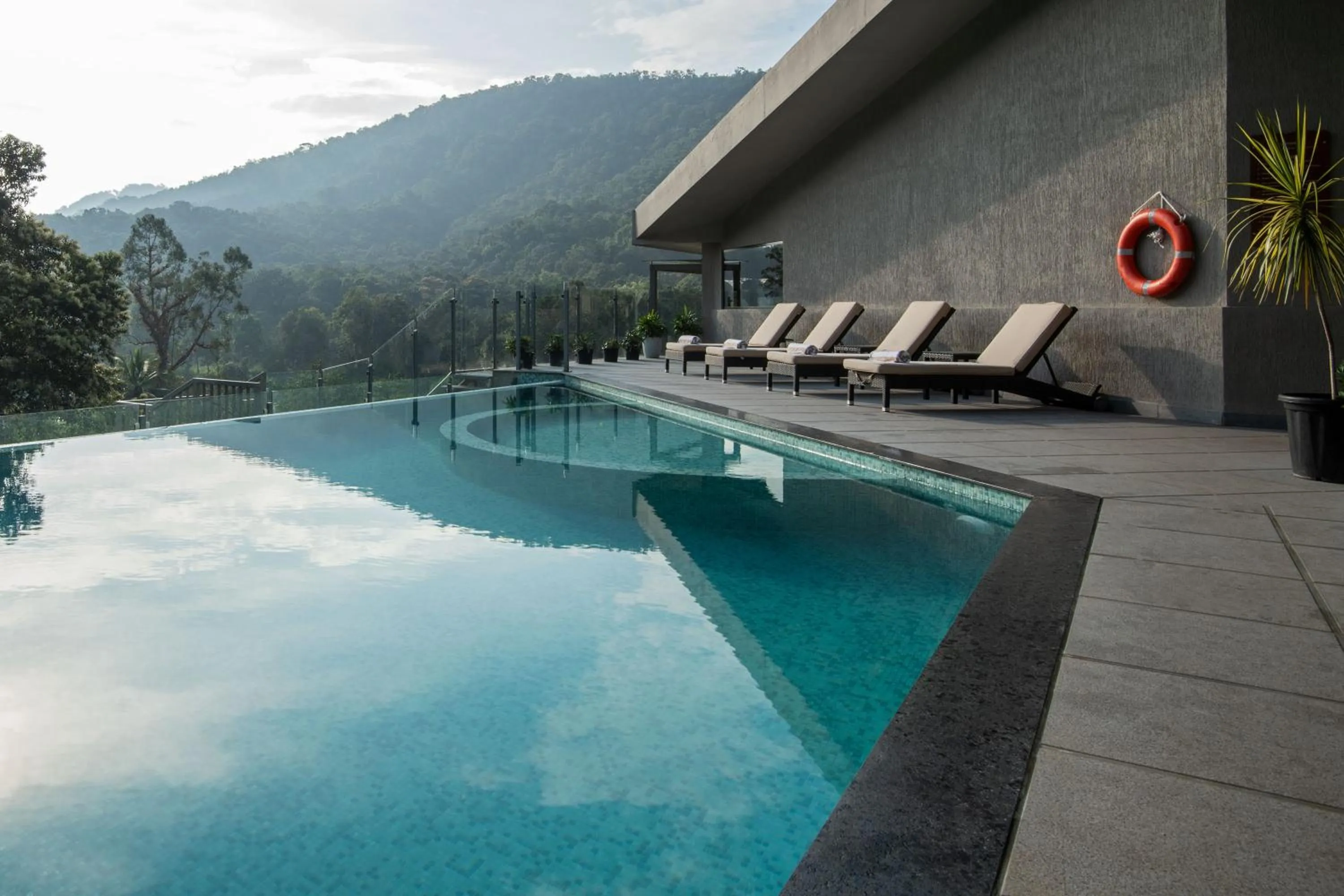 Swimming pool in Niraamaya Retreats Samroha Athirappilly