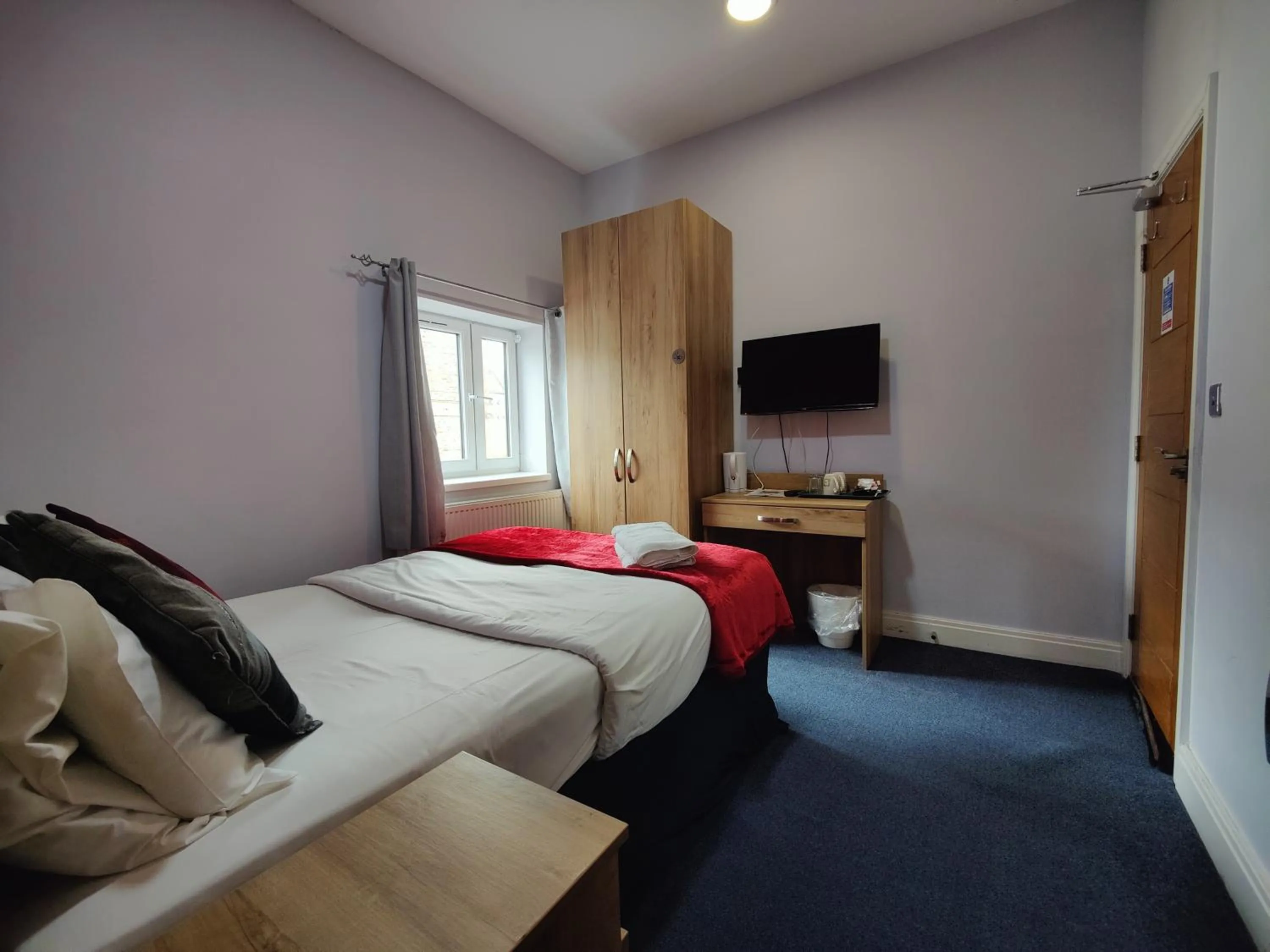 Bed in Wellesley Hotel