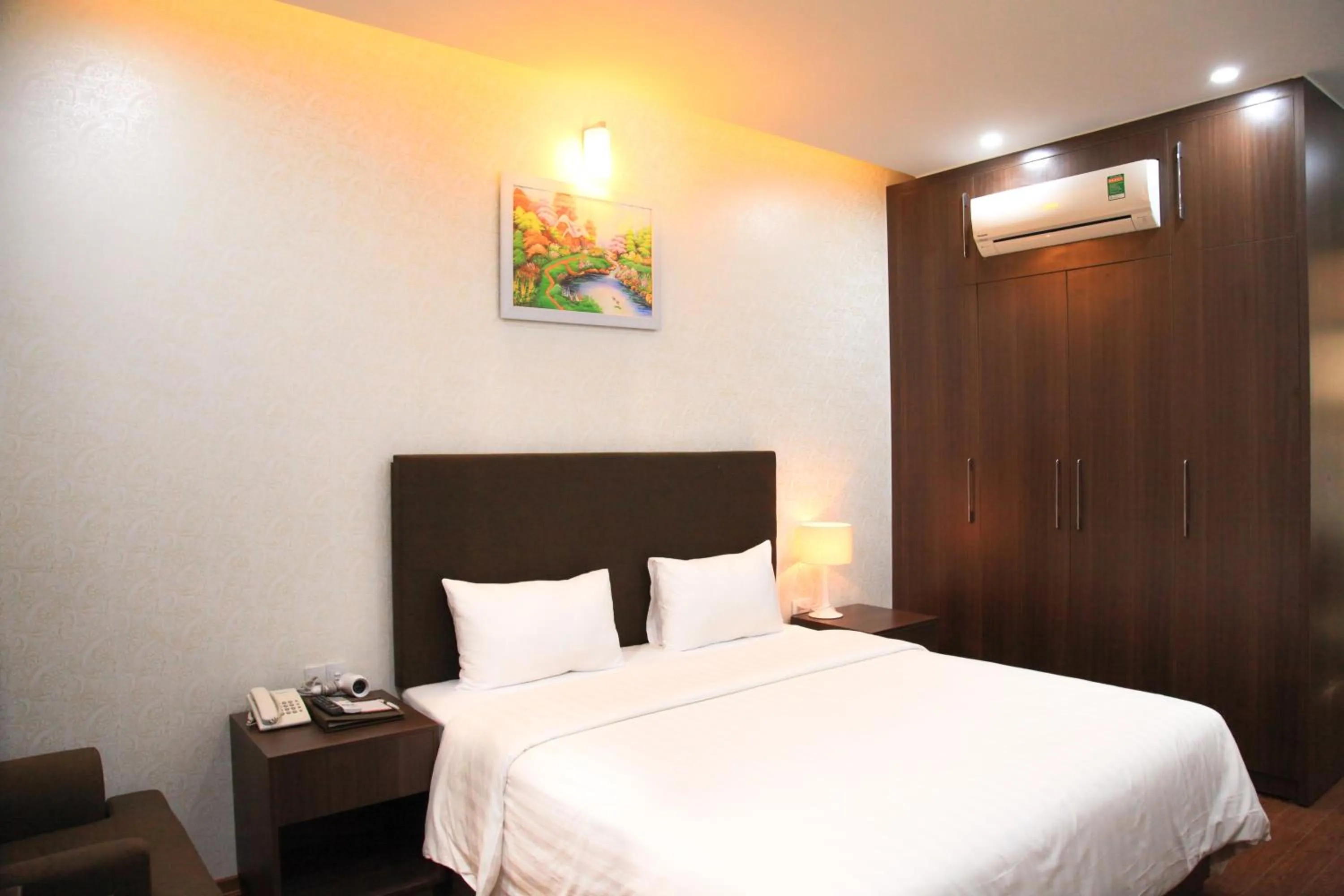 Bed in Bình Minh Hotel