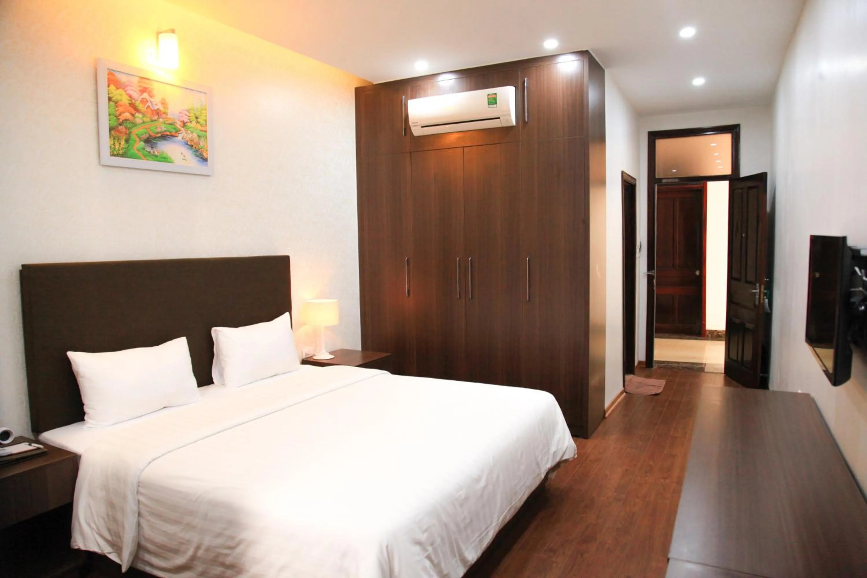 Communal lounge/ TV room, Bed in Bình Minh Hotel