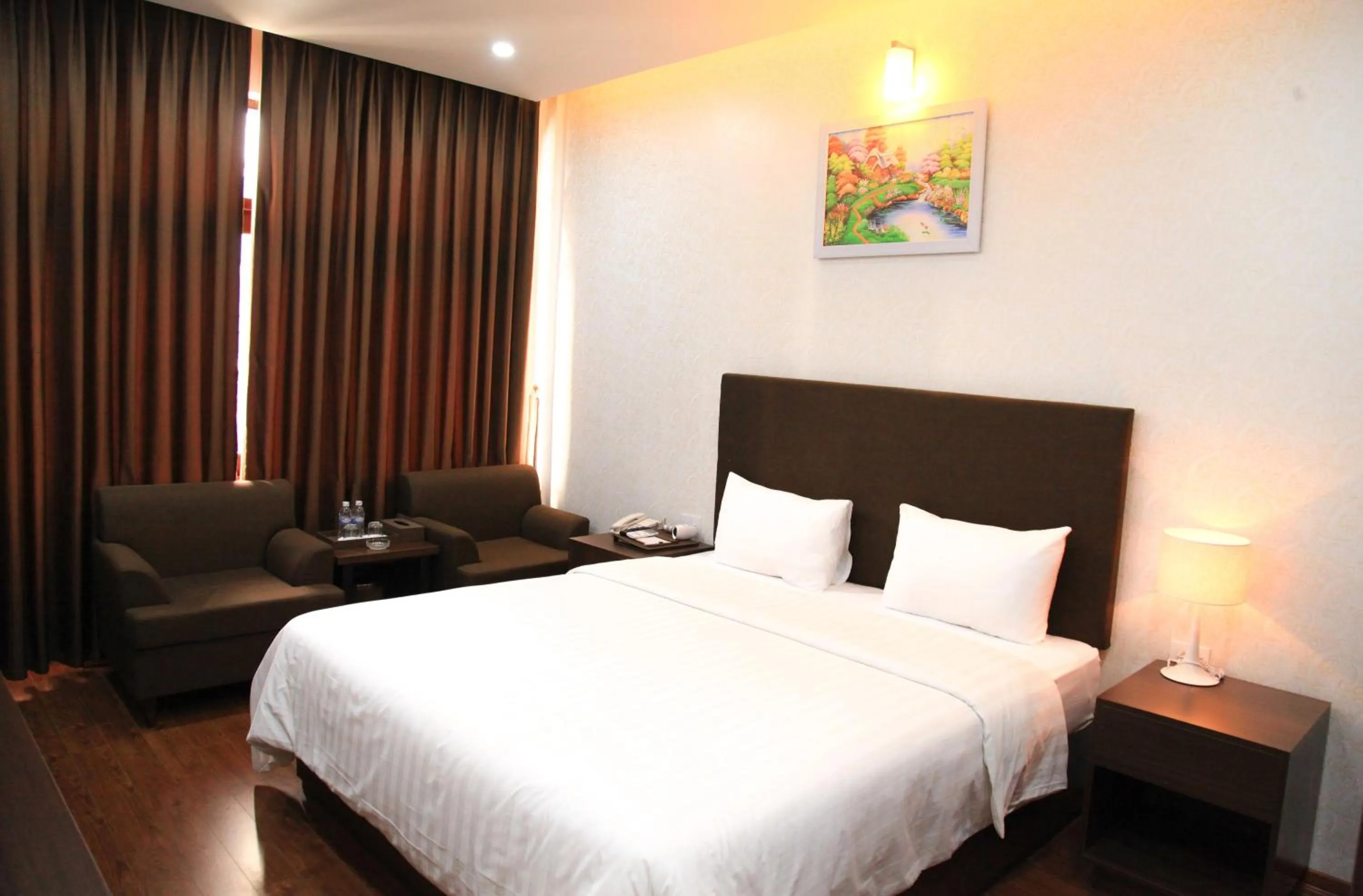 Bed in Bình Minh Hotel