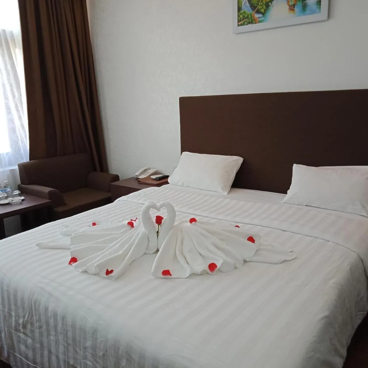 Bed in Bình Minh Hotel