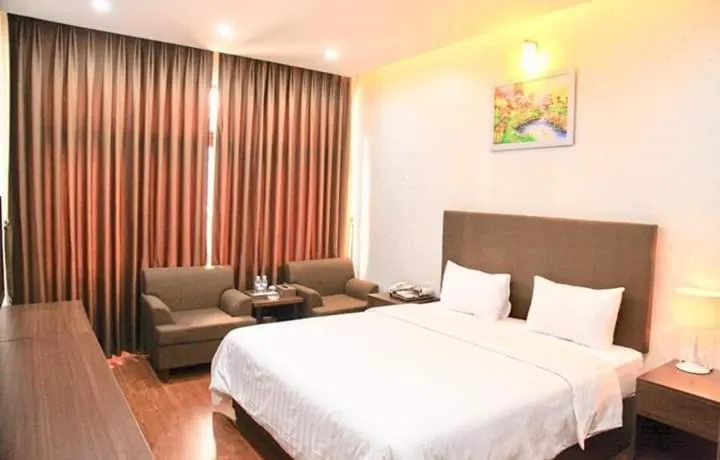 Bed in Bình Minh Hotel