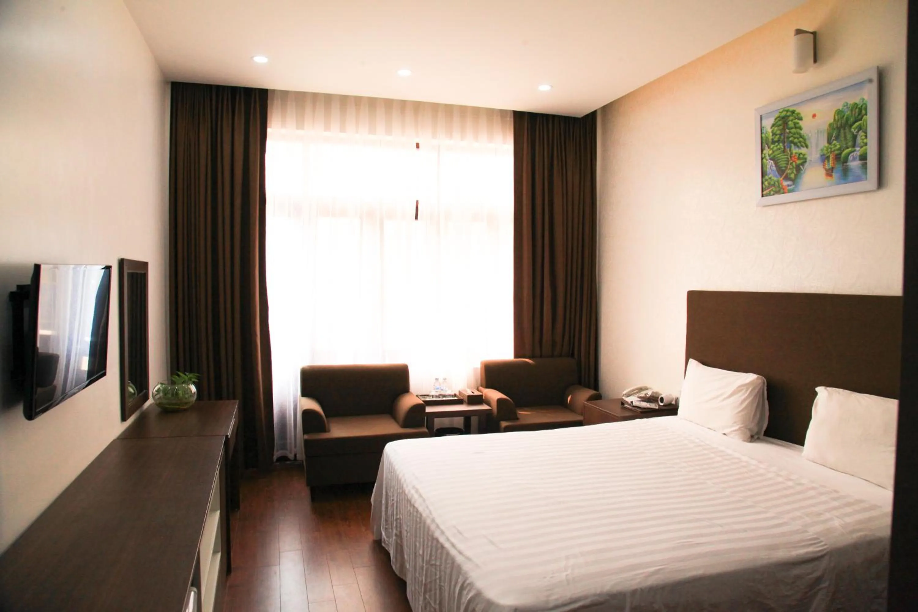 Bed in Bình Minh Hotel