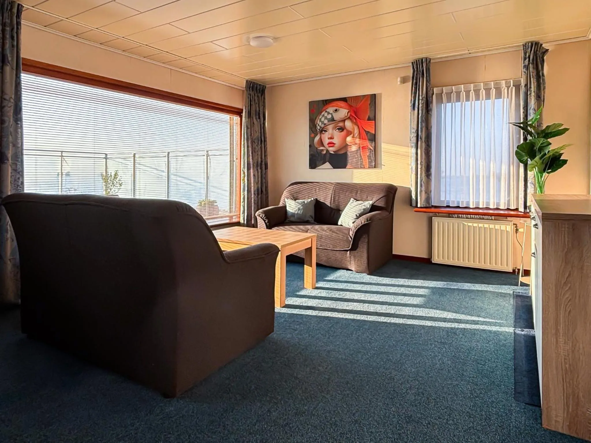 Living room in VISSERSLUST Rooms, Apartments and Houseboats