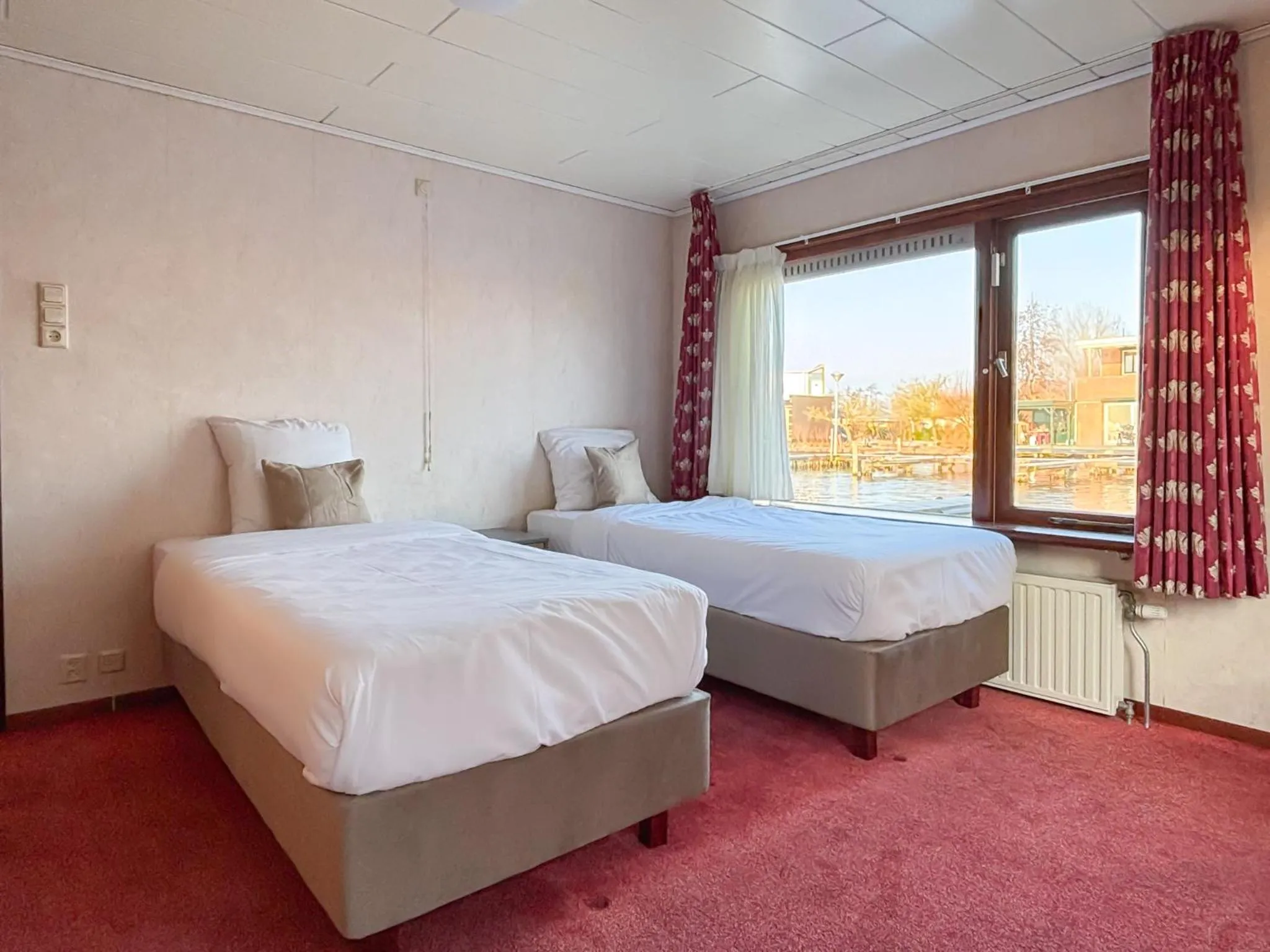Bed in VISSERSLUST Rooms, Apartments and Houseboats