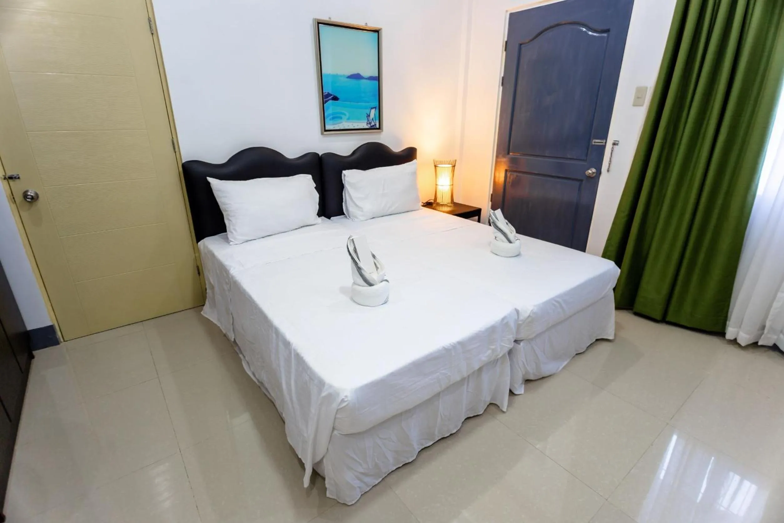 Bed in MADISON GARDEN AND RESIDENCES