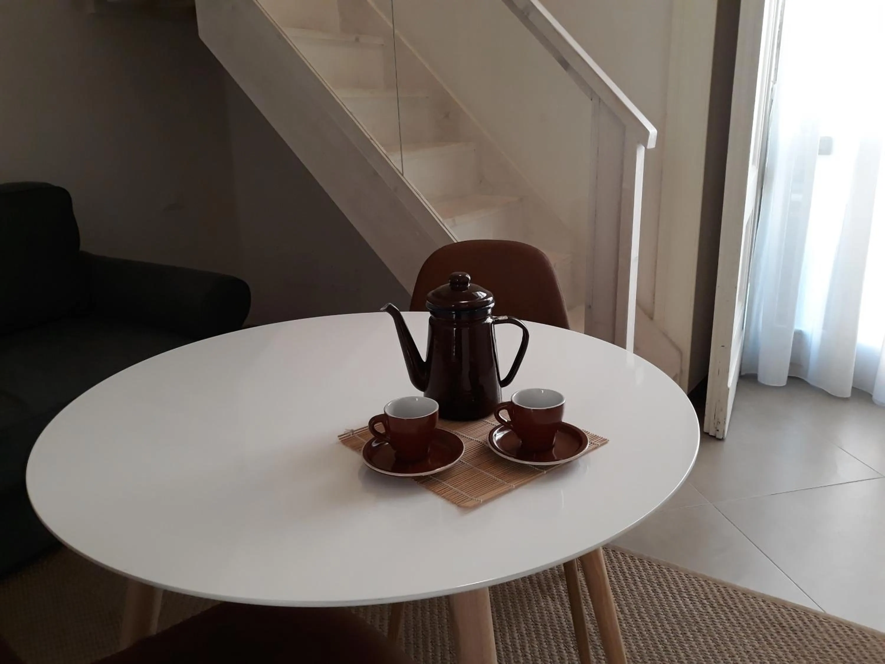 Dining area in Piano Nobile by Napoliapartments