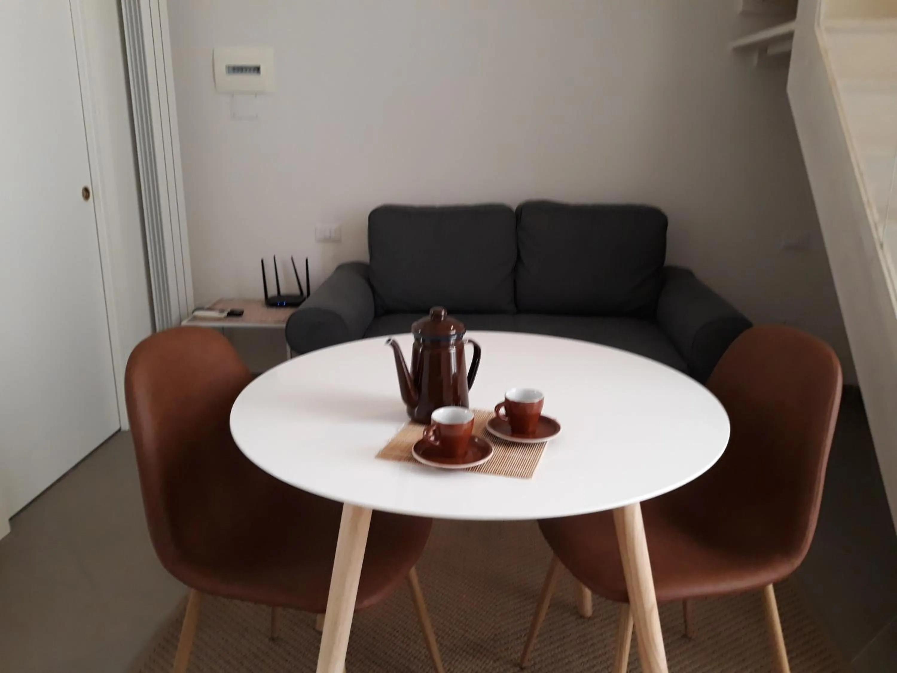 Dining area in Piano Nobile by Napoliapartments