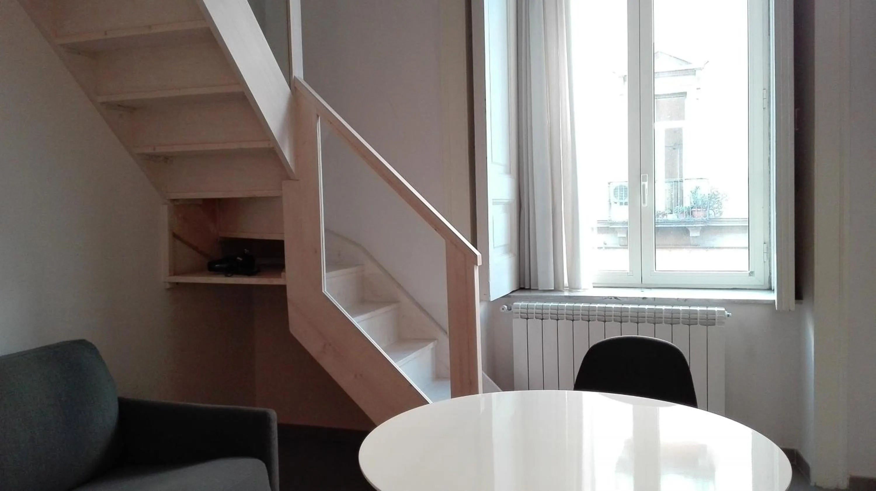 Seating area in Piano Nobile by Napoliapartments