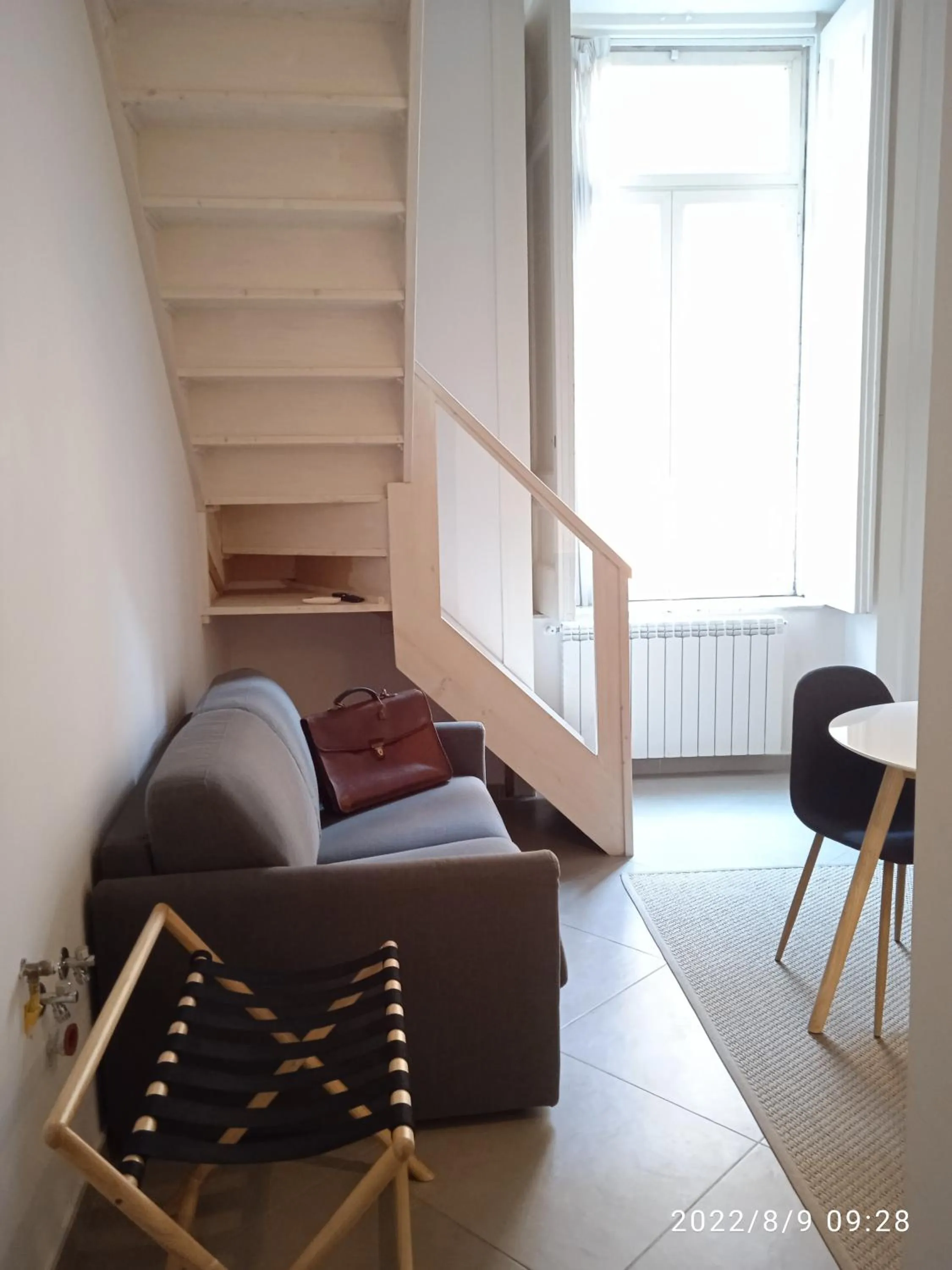 Living room in Piano Nobile by Napoliapartments