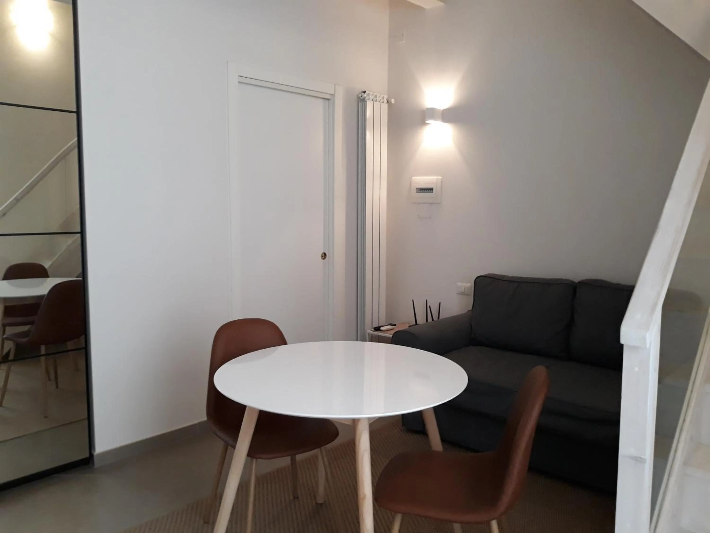 Seating area in Piano Nobile by Napoliapartments