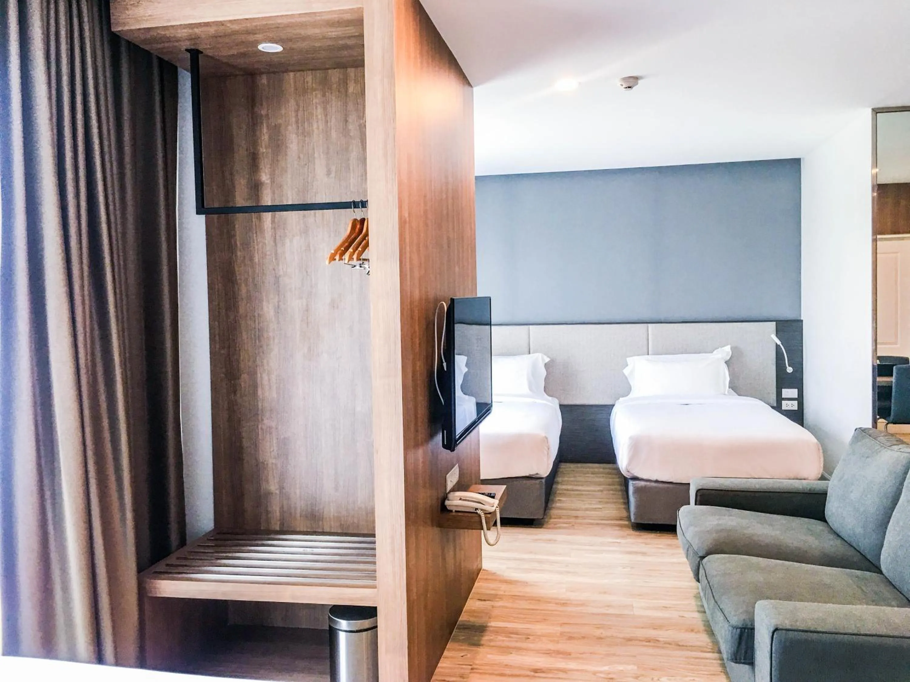 Seating area, Bed in Fortune Hotel Buriram