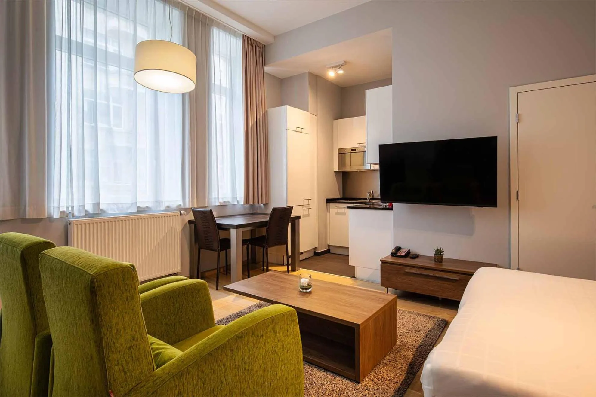 Communal lounge/ TV room in Thon Residence Florence Aparthotel