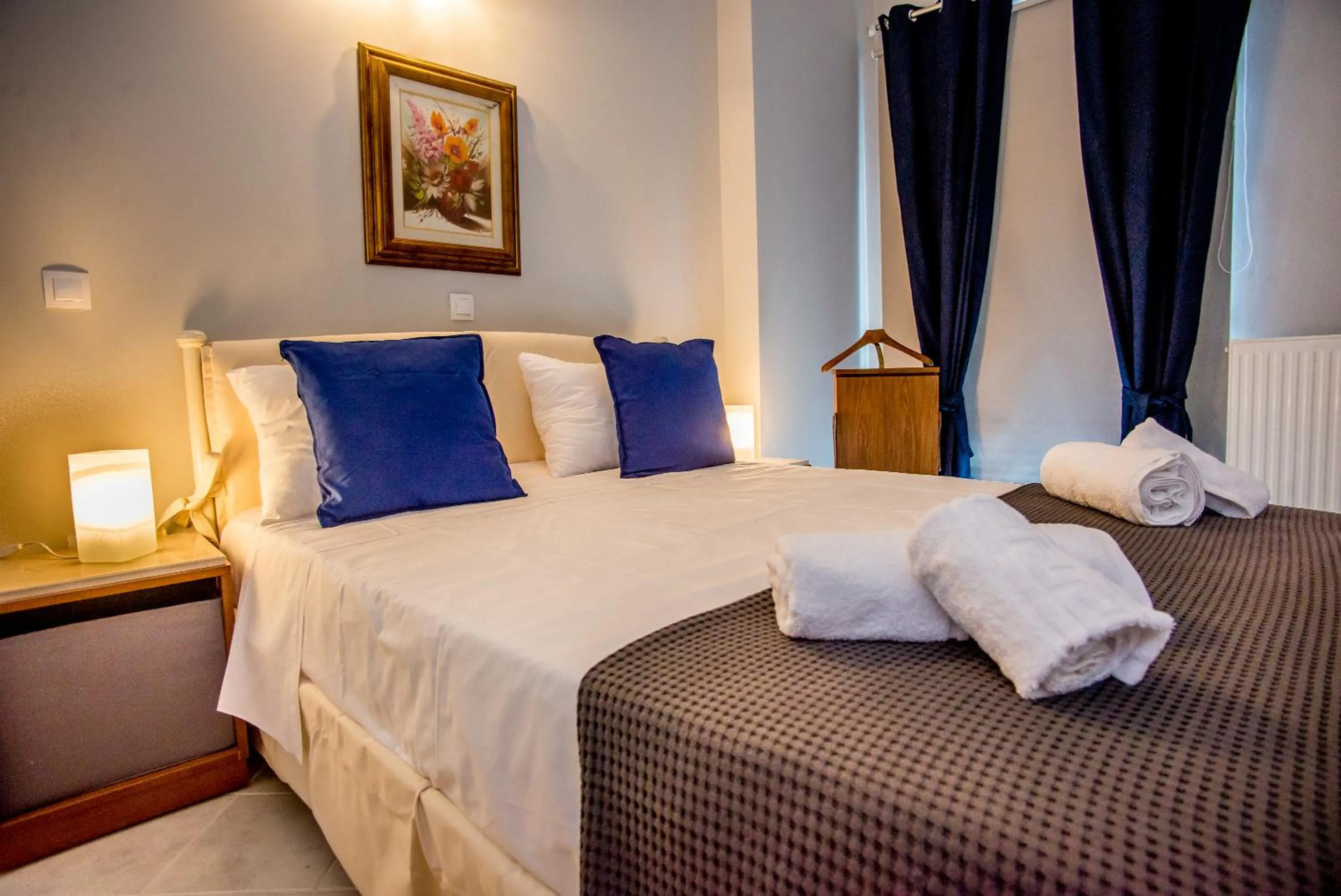 Bed in Xenia Ionis luxury apartments