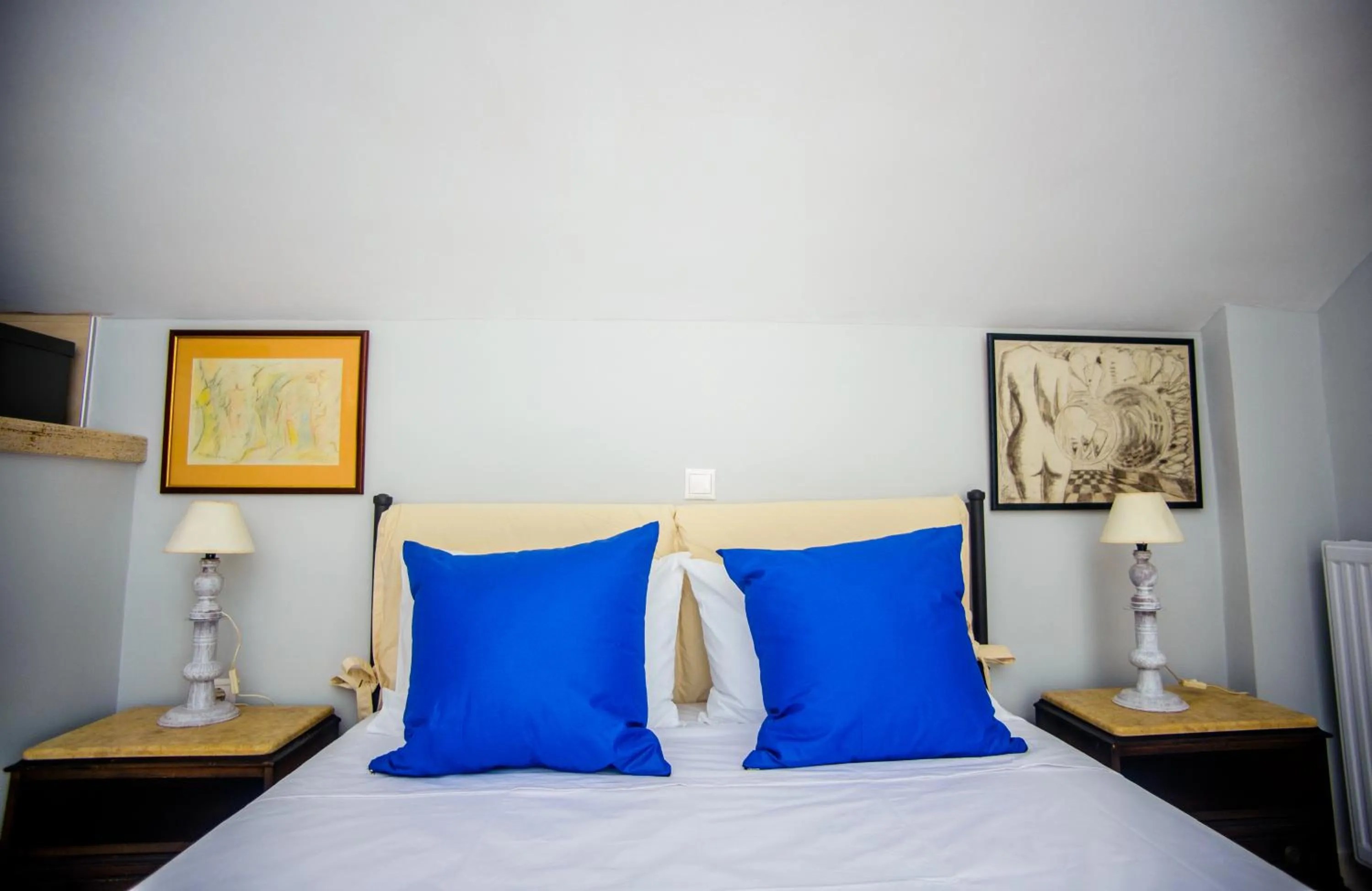 Bed in Xenia Ionis luxury apartments