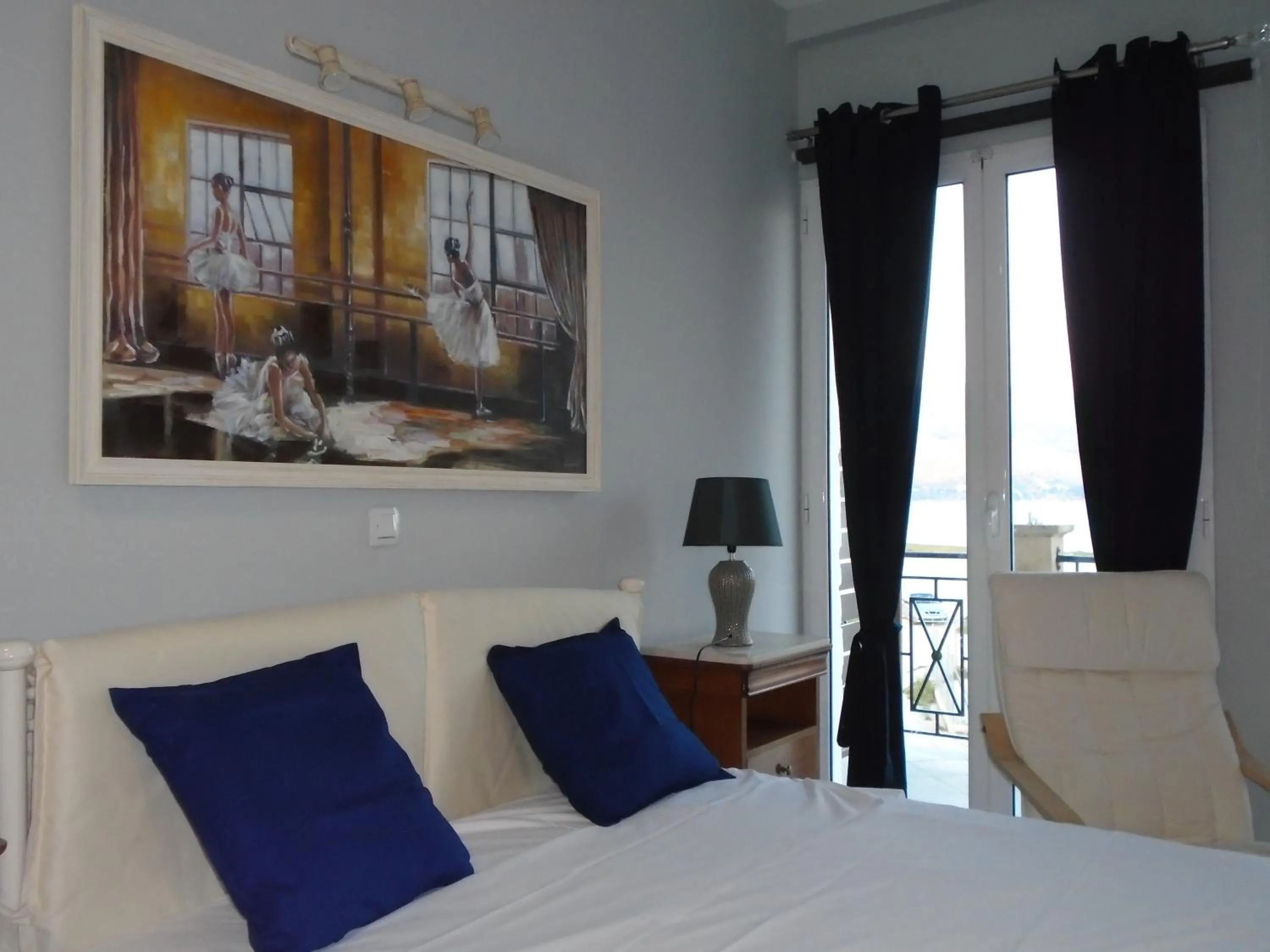 Bed in Xenia Ionis luxury apartments