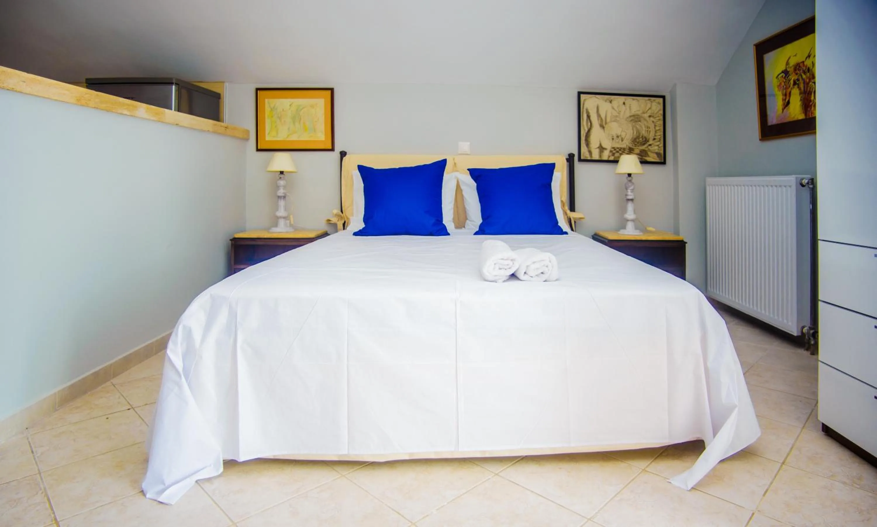 Bed in Xenia Ionis luxury apartments