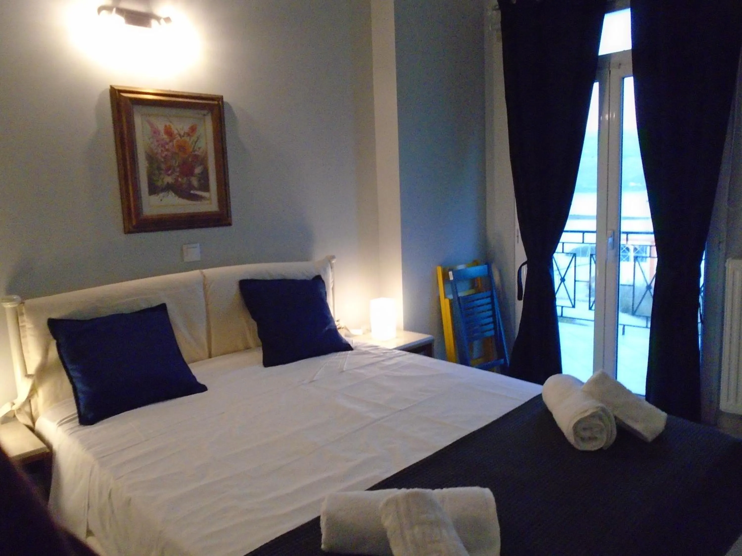 Bed in Xenia Ionis luxury apartments