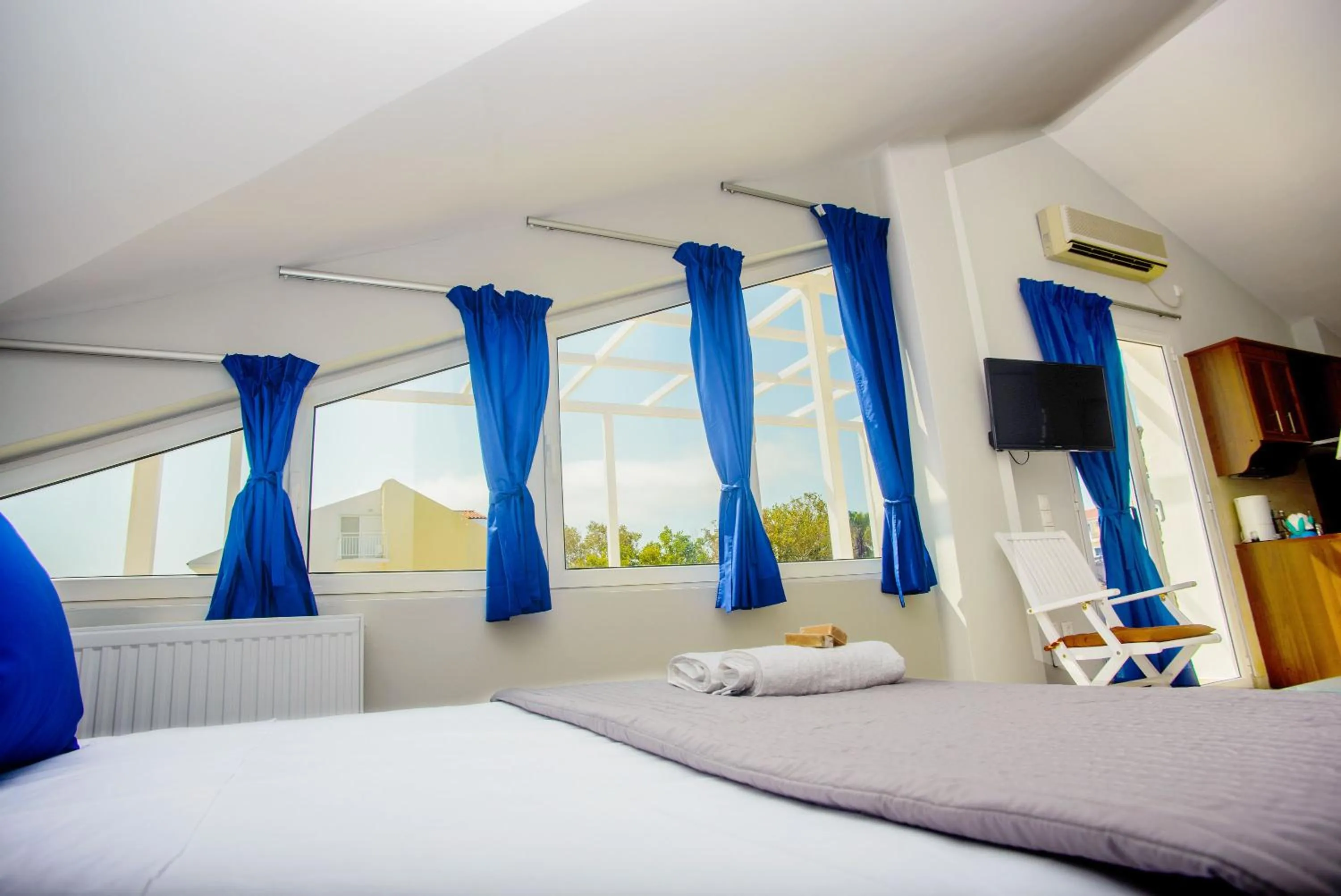 Bed in Xenia Ionis luxury apartments