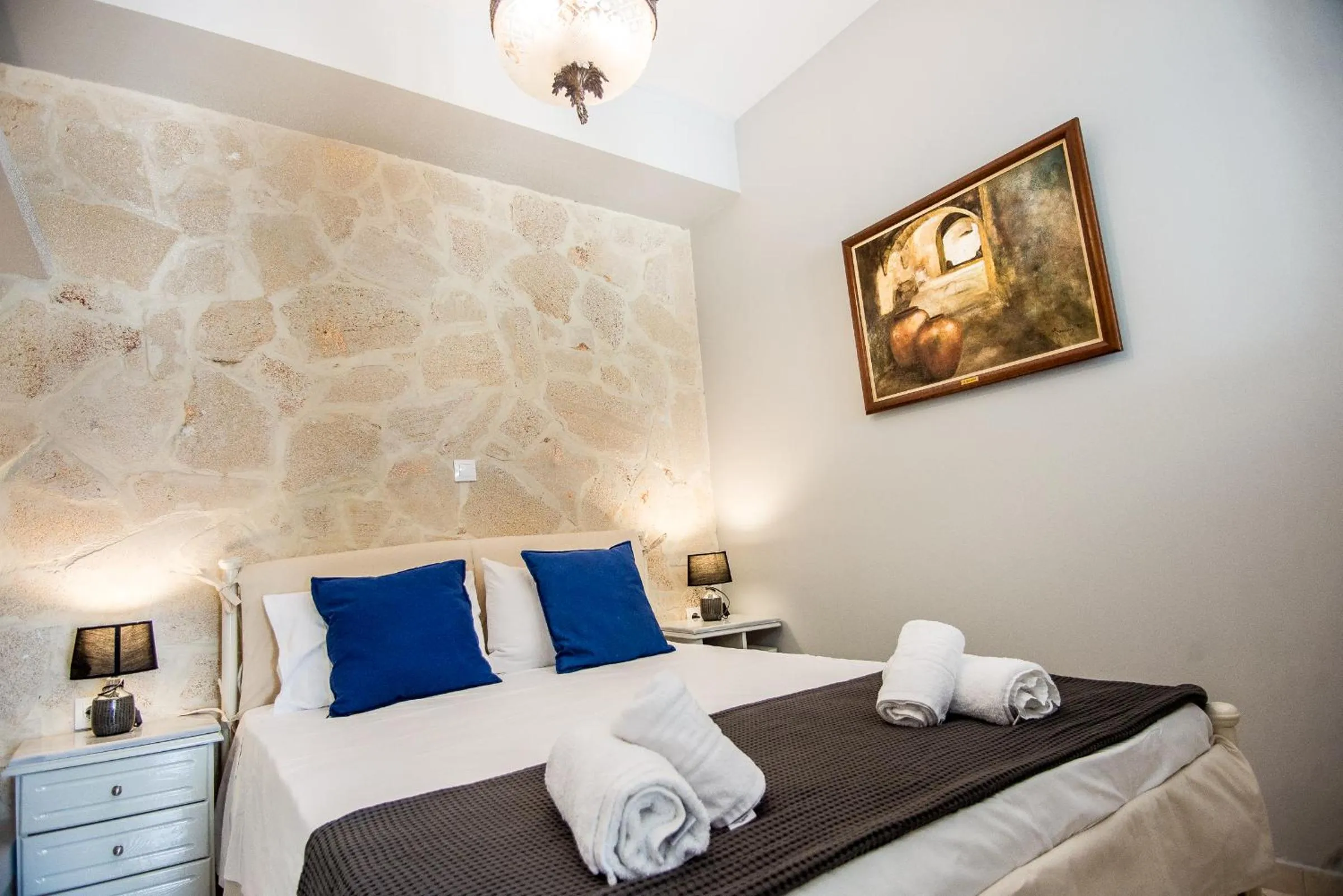 Bed in Xenia Ionis luxury apartments