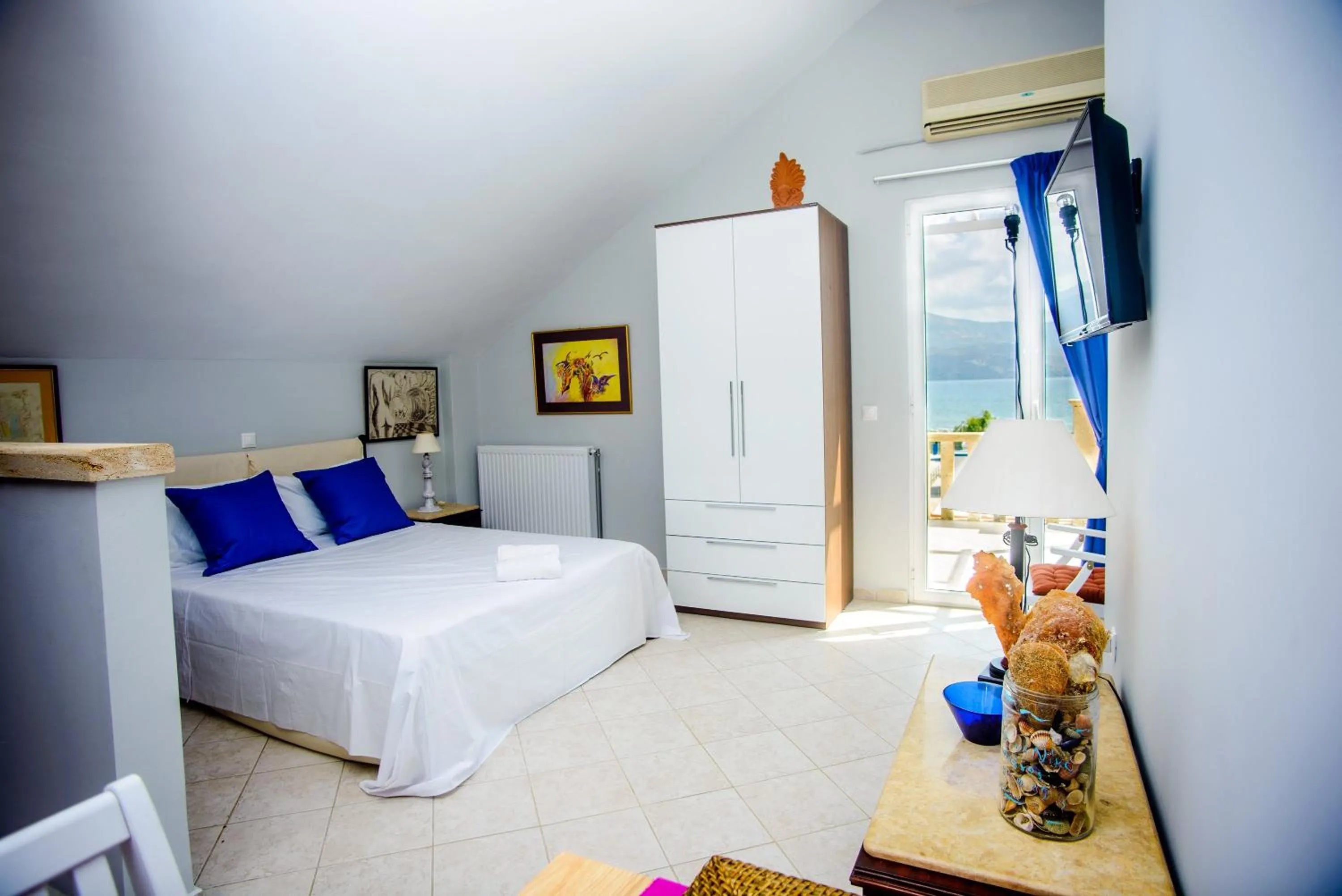 Bed in Xenia Ionis luxury apartments