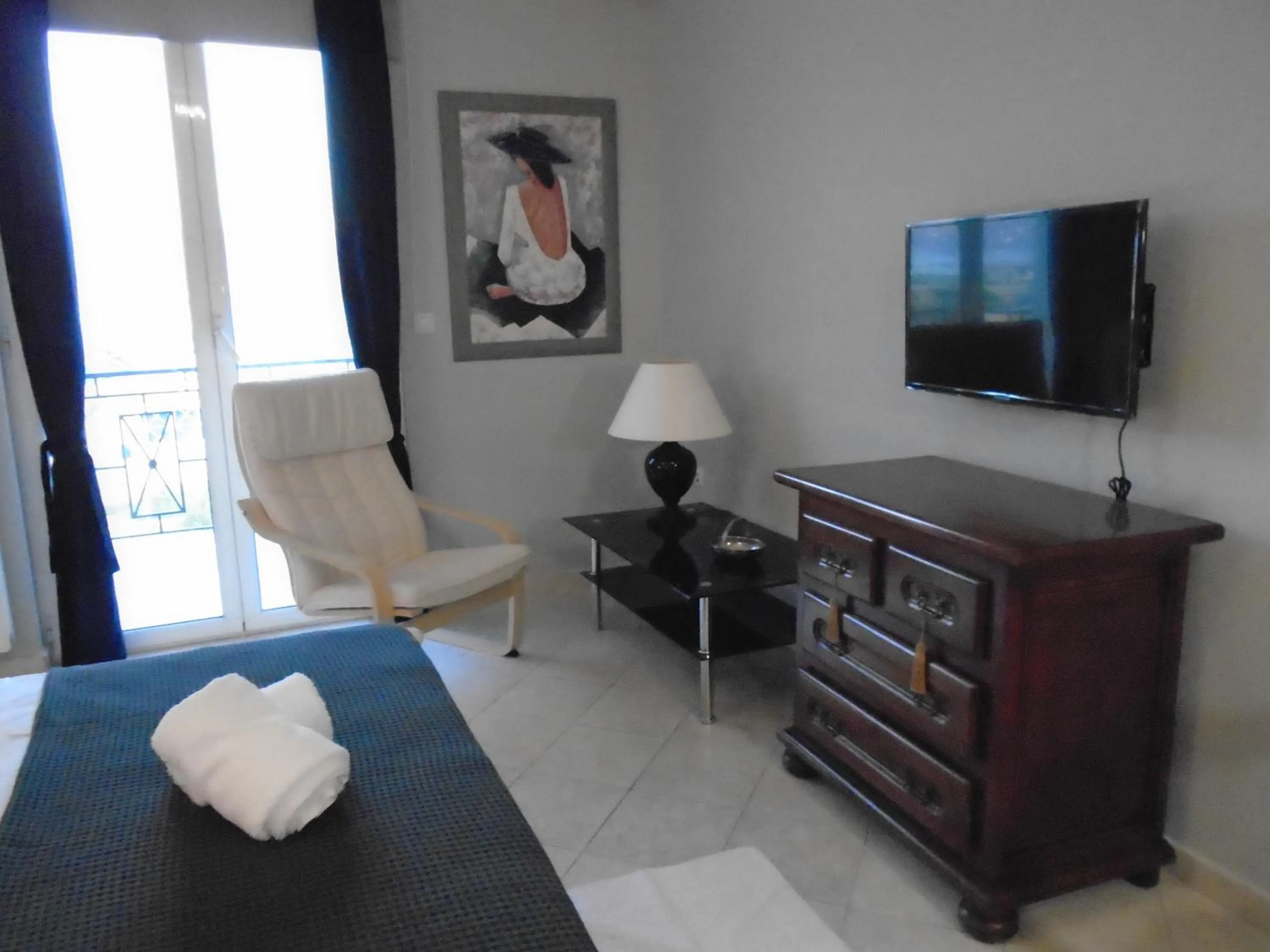 Bed in Xenia Ionis luxury apartments