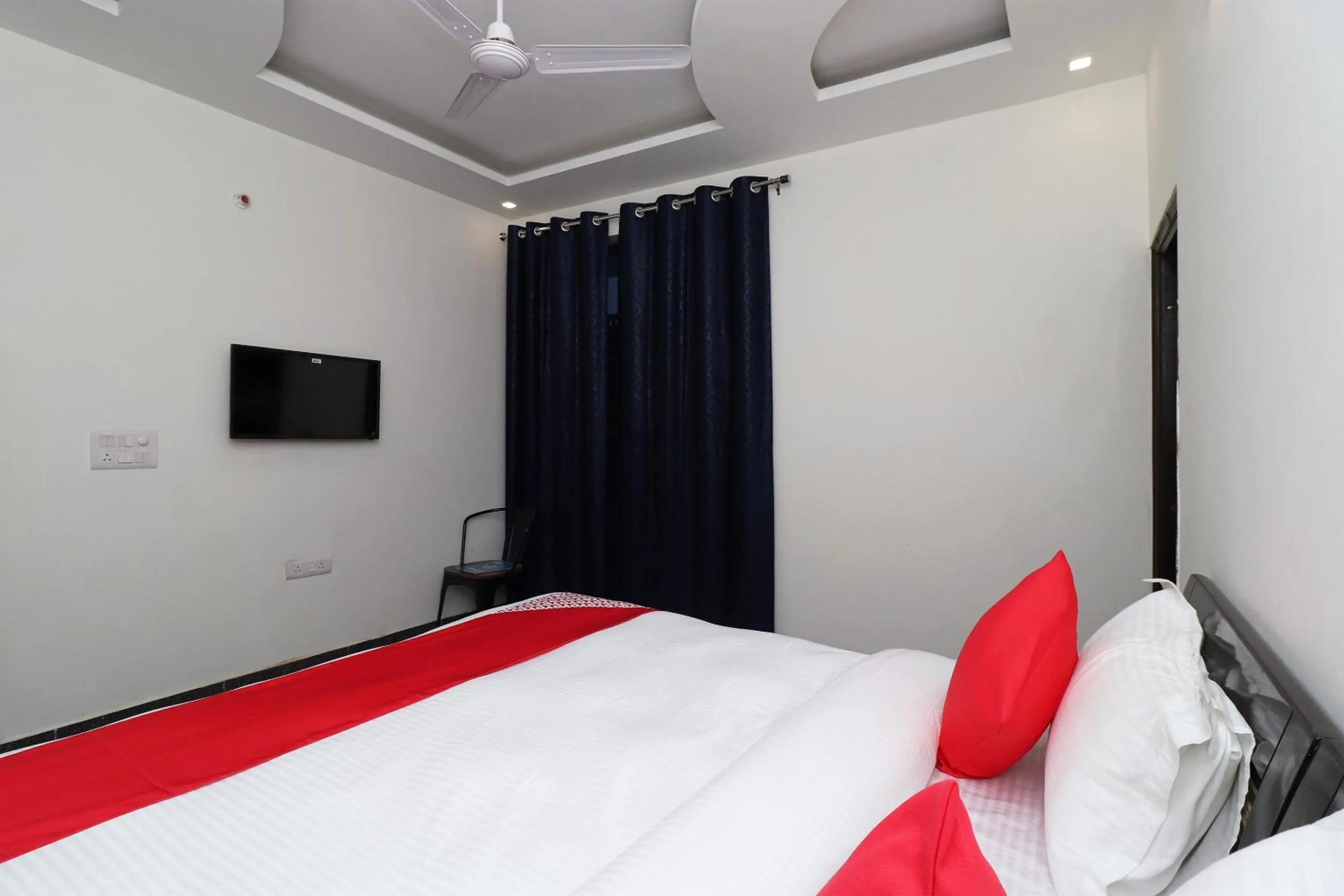 Bedroom in Hotel O Laxmi Residency