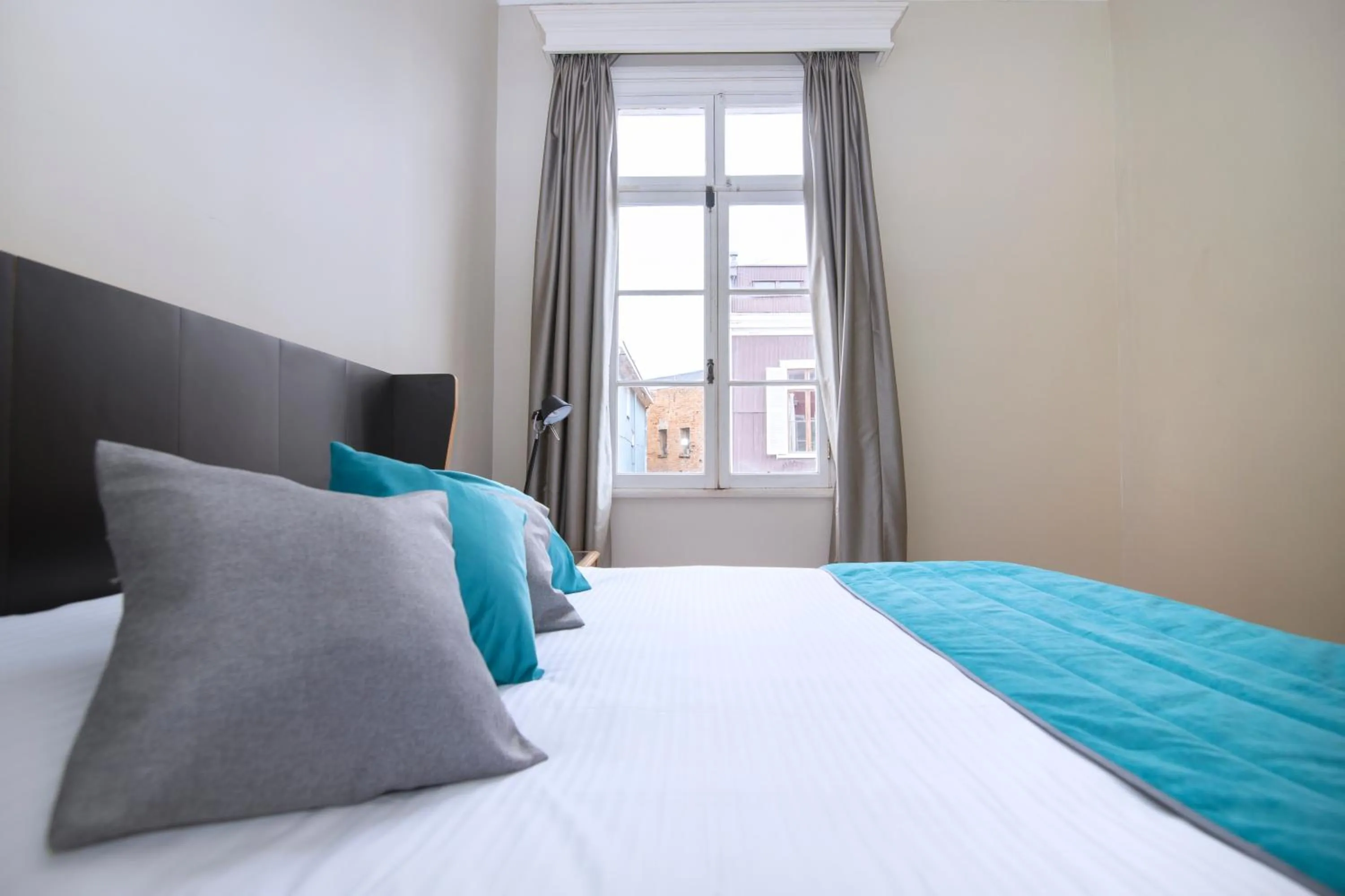 Bed in New Voga Hotel Boutique