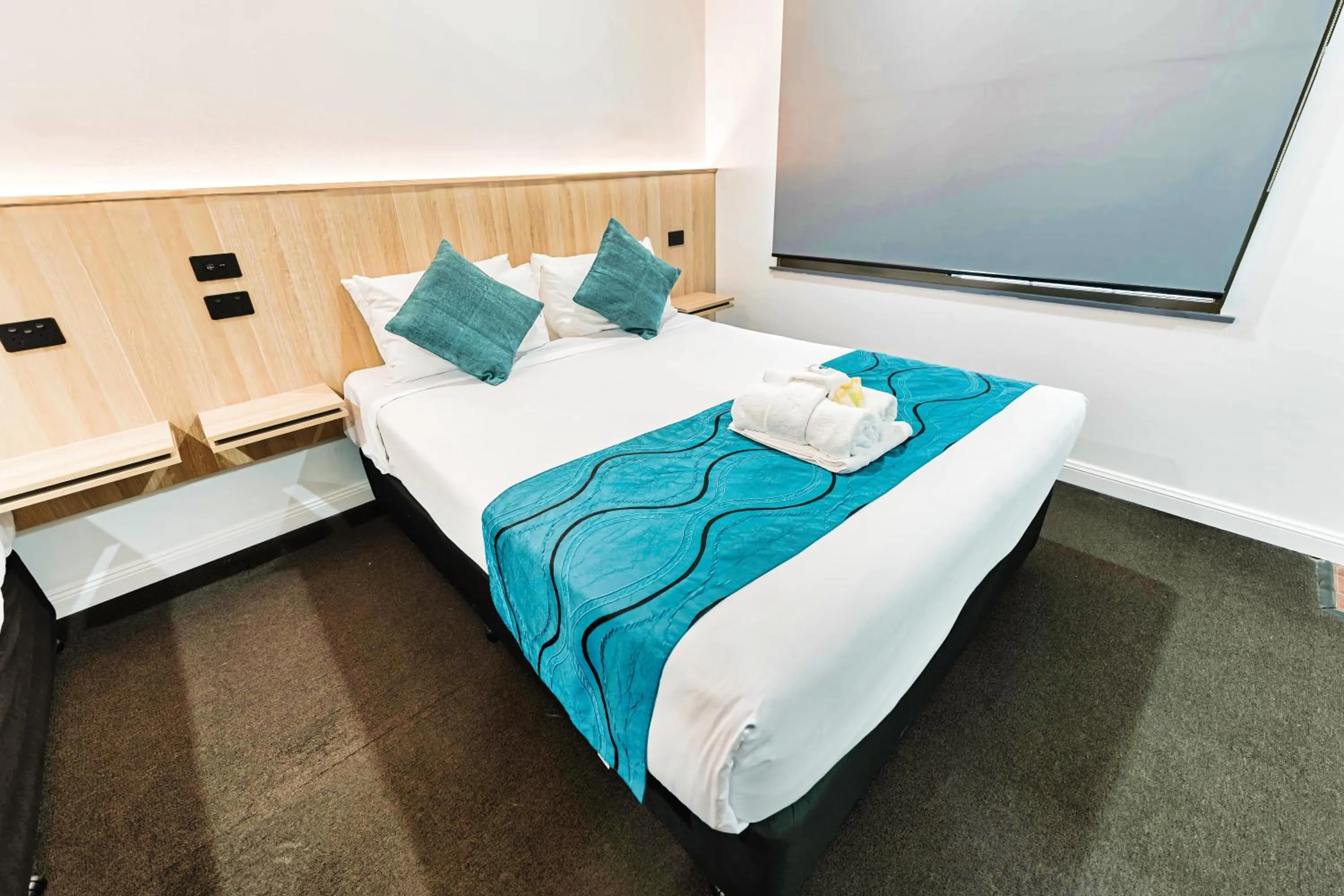 Bed in Country 2 Coast Motor Inn Coffs Harbour